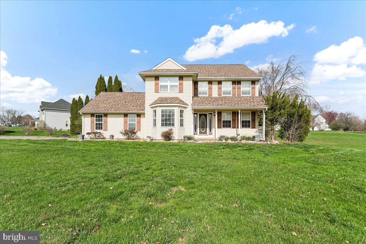 Welcome to this charming 2-story colonial, lovingly built and owned by the original owner, nestled on a pretty 1.1-acre corner lot with scenic views! Located in the small, no-HOA Meadowbrook community, this home offers a unique opportunity to personalize and update, providing instant equity with just a little cosmetic work and personal touches.  Available exclusively through an Estate Sale, this affordable gem is a rare find within the Oxford School District. The inviting front porch is the perfect spot to enjoy your morning coffee while watching the sunrise. Inside, the main level features a living room, a dining room, a convenient powder room, and a cozy family room with a gas fireplace. The family room flows seamlessly into the eat-in kitchen, which boasts doors leading to the deck and backyard—ideal for outdoor relaxation or entertaining. Upstairs, the primary bedroom offers a walk-in closet and a private full bathroom. Three additional bedrooms share a full hall bathroom. The partially finished basement featured a billiards and bar area, the seller is leaving the bar—it could easily be converted back into entertaining space. Additionally, the basement includes a laundry area with a utility sink and Bilco doors that lead to the backyard.  The expansive yard includes a storage shed for your tools and outdoor equipment, and the seller is generously leaving the John Deere lawn mower for the new owner’s convenience. Notable updates include a brand new roof (2022), new hot water heater (2021), and a new well pump (2025). You will enjoy the peace and tranquility of this location while being just minutes from the charming town of Oxford, and a short drive to the scenic Chesapeake Bay in Maryland for summer fun and Delaware’s tax-free shopping.  Commuting to nearby amenities is a breeze! Don’t miss this rare opportunity to own a home with incredible potential in a serene setting. Schedule your showing today!