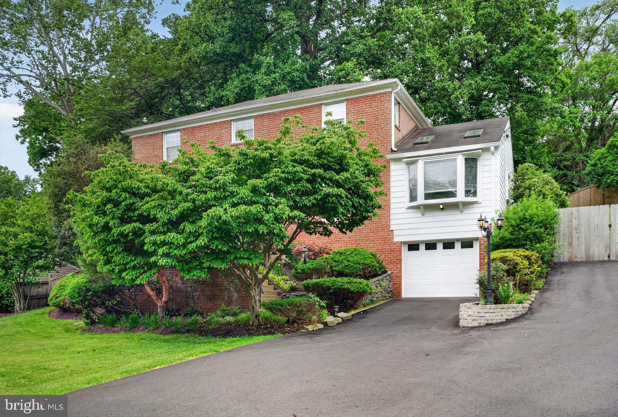 Veterans ask about assuming the current 2.75% VA loan --MOVE IN READY!!! This updated all-brick colonial on a private half-acre delivers the finish of new construction with the soul of a home that has been painstakingly cared for. A honed marble foyer and curved wrought iron staircase set the tone: gracious formal rooms, hand-built architectural ceilings, ornamental millwork, and freshly refinished original white oak hardwood floors throughout.

To one side, a formal dining room. To the other, a sunlit step-down parlor beneath a custom ceiling dome and crystal chandelier. Ornamental crown molding, chair rail, and wainscoting carry from room to room. Every interior door is new solid wood, fitted with premium lever hardware. Every exterior door replaced, including a triple-pane steel French patio door with internal blinds.

The family room is anchored by a wood-burning fireplace with carved mantel over a marble-look hearth, painted brick, and an architectural coffered ceiling with dentil molding. French doors open to the renovated gourmet kitchen.

The kitchen, a complete gut renovation, centers on a 48-inch built-in stainless steel refrigerator/freezer, a six-burner professional gas rangetop on the island with telescopic downdraft, and a wall oven and microwave with warming drawer. Floor-to-ceiling custom cabinetry, American-made, solid wood, soft-close, with dual pantries, pull-out drawers, mixer lift, spice storage, and 36-inch double-deep drawers. Quartz countertops, 36-inch farmhouse sink with commercial faucet, 1-HP ultra-quiet disposal, reverse-osmosis filtration, instant hot water dispenser, and subway tile backsplash with adjustable LED lighting. Dual skylights and a bay window with custom built-in seating. Laundry room with custom countertop, mega-capacity front-load washer and dryer, built-in storage, and patio access.

Upstairs, the primary suite opens through double doors to ornamental crown and recessed lighting. The walk-in closet, a converted full bedroom, offers floor-to-ceiling built-in storage with integrated desk. A second walk-in closet. The en-suite spa shower: body jets, rainfall head, hand shower, and tiled bench within a glass enclosure. Cherry vanity with granite top and heated LED mirror.

Two additional bedrooms with hardwood floors and smart ceiling fans with decorative medallions. The hall bath: new porcelain top, faucet, LED mirror, and tile surround with ornamental diamond inlay. The powder room: deep navy walls above white wainscoting, marble-top vanity, and heated LED mirror.

The finished walkout lower level offers flexible living with premium luxury vinyl flooring, a dedicated room with closet, and a full bathroom built from scratch. Walk-in shower in marble-look porcelain floor to ceiling, dual niches with mosaic accent, frameless glass enclosure, fold-down bench, heated fan, and marble-top vanity. Cedar-lined closet and open recreation area.

Systems match the surfaces. A 2024 high-efficiency dual-fuel HVAC, heat pump with variable-speed blower paired with a 97% gas furnace, 10-year manufacturer warranty, whole-house humidification, air purification, and near-HEPA filtration. 200-amp electrical. Large 55-gallon water heater and stainless steel chimney liner. 

Smart thermostat, smart lighting, interconnected smoke detectors. Overhead lighting in every room: recessed fixtures, chandeliers, dimmers, and coordinated exterior package. Cellulose attic insulation with radiant barrier.

Outside, brand new driveway built from a premium base, extending to the rear patio, with one-year warranty, expansive, multi-level deck with built-in seating, curtained gazebo, and a fully fenced backyard. Brick paver patio, cedar playground, organic garden beds, stone retaining walls, arborvitae screening, and mature plantings on an organic lawn. Heated attached garage with premium insulated door.

Pet-free and scent-free. MOVE WITH CONFIDENCE! Premium home Warranty!