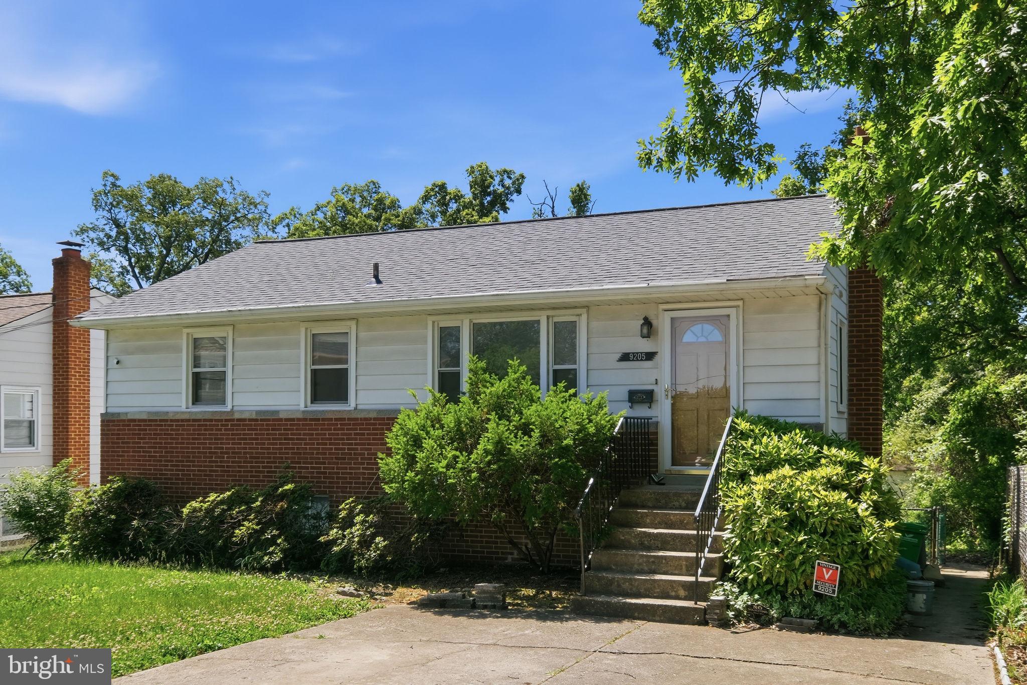 Estate Sale Opportunity! Welcome to 9205 4th Street, Lanham, MD, a solid brick rambler offering endless potential for buyers looking to build sweat equity while customizing a home to fit their lifestyle. This 3-bedroom, 1.5-bath home features real hardwood flooring throughout the main level, providing a timeless foundation for future updates.

The main level offers three spacious bedrooms, a full bathroom, a generously sized kitchen, and direct access to the rear balcony overlooking the backyard. The finished walk-out lower level expands the living space with a large recreation area perfect for entertaining, a convenient half bathroom, a separate room ideal for a home office, gym, or hobby room, and additional storage space. The walk-out basement provides direct access to the backyard, adding flexibility and functionality to the home's layout.

Outside, enjoy a flat and usable backyard with plenty of space for gardening, outdoor gatherings, or future enhancements. The front driveway provides off-street parking for two or more vehicles.

Conveniently located near the New Carrollton Metro Station, MARC Train, and Amtrak, this home offers excellent commuter access to Washington, DC, Baltimore, and surrounding areas. Major highways including I-495, Route 50, and the Baltimore-Washington Parkway are just minutes away. Nearby shopping, dining, and everyday conveniences include Woodmore Towne Centre, Wegmans, Costco, Target, and numerous local restaurants and retail options.

Whether you are a first-time buyer, investor, or someone looking to create your dream home over time, this property presents an exceptional opportunity in a convenient Prince George's County location.