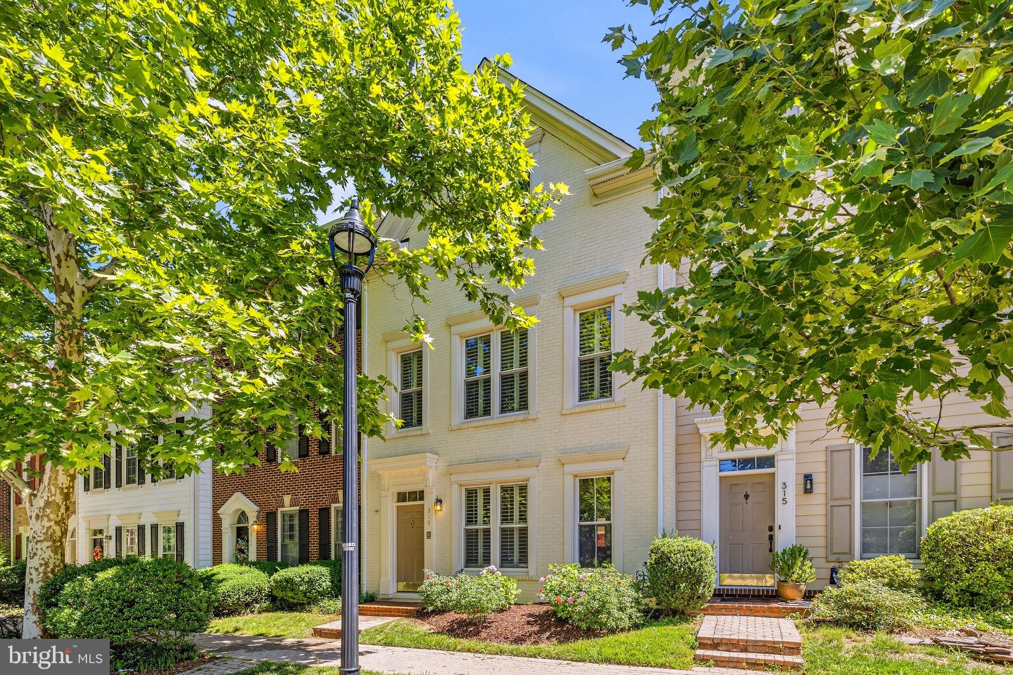 Welcome to 313 Hillwood Ave in prestigious Falls Church—a beautifully appointed townhouse that offers elevated living in one of Northern Virginia's most sought-after communities. Within walking distance of vibrant Falls Church City, this home combines luxury and convenience while being located in award-winning school districts that families trust and value. Step inside to discover a gourmet kitchen perfect for creating memorable meals, complete with luxurious heated floors for ultimate comfort, a newly remodeled luxury main bathroom that feels like a spa retreat with premium finishes and modern comfort, and stunning hardwood floors on the main level that add warmth and elegance throughout. You'll also enjoy peace of mind knowing that major systems have been recently updated—the roof, windows, and HVAC system were all installed in 2018, ensuring efficiency, comfort, and durability for years to come. Recently updated windows keep the interior remarkably quiet — a peaceful escape even on a busy street. Step outside to your private patio garden in the back, a serene outdoor retreat perfect for relaxing, entertaining, or tending to your favorite plants. This isn't just a house—it's a lifestyle upgrade in a neighborhood people choose and stay in, where everything you need is close by: excellent schools, local shops, restaurants, parks, and convenient grocery options including Whole Foods Market, Harris Teeter, and Aldi—all within walking distance. Perfect for families, professionals, and anyone seeking quality living with genuine character and move-in readiness. Schedule your showing this weekend and discover why Falls Church residents love calling this community home.