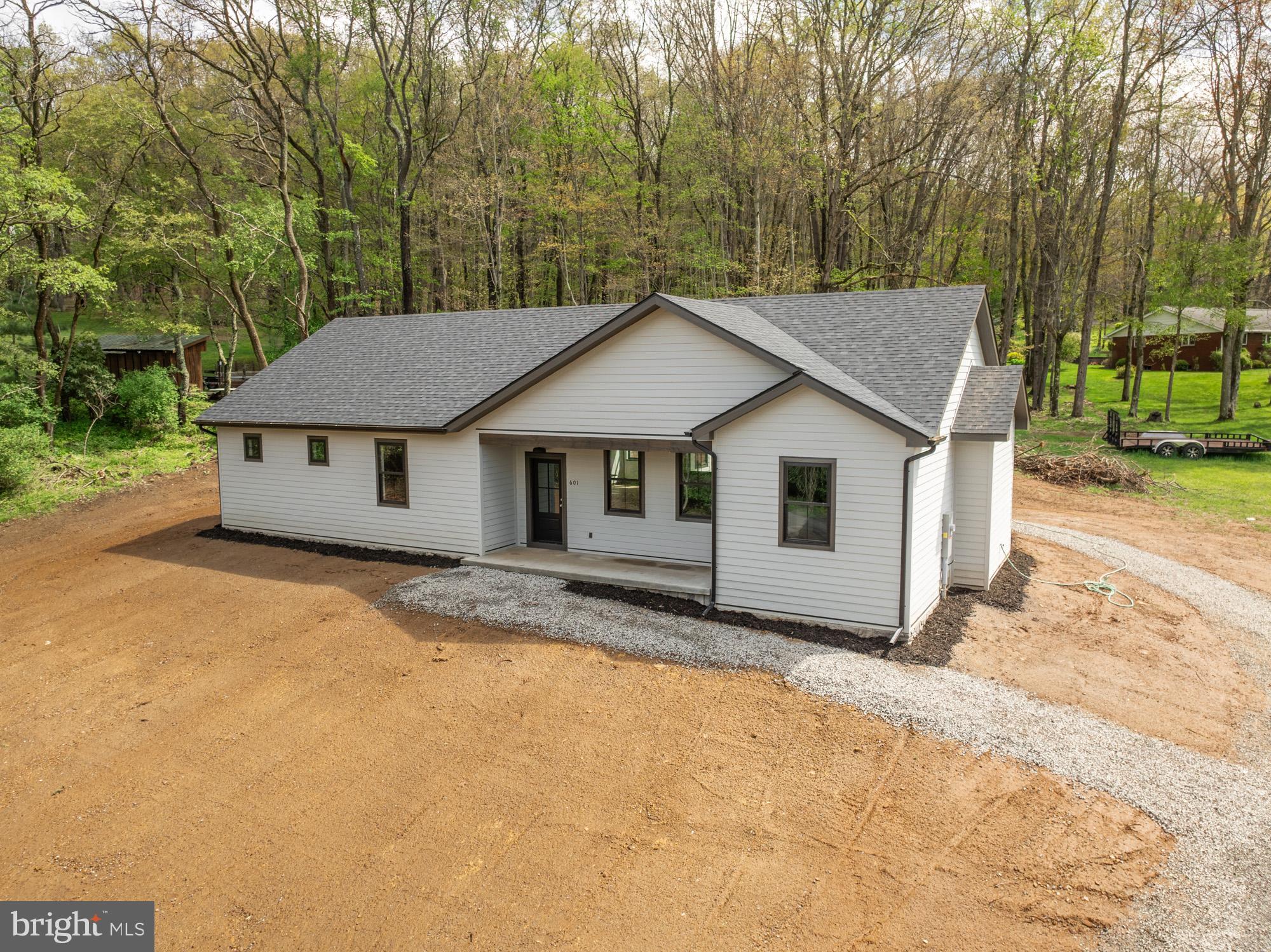 BRAND NEW CONSTRUCTION! 3BR/2.5BA home in Country Club Acres, near Oakland golf course! 2,142sf and roughly .79 acres of land (lots 45 & 46 combined). Modern design offering plenty of natural light, open living and elite finishes. Features include Andersen windows & slider, custom tile bathrooms, stone fireplace, gourmet kitchen, Kraftmaid cabinets, granite counters and an incredibly energy efficient structure. Enjoy one level living with a sensible floor plan and quality materials. Country Club Acres is a fantastic community (NO HOA) just outside of town with easy access to town parks, sport courts, trails, Yough River & Herrington Manor + Swallow Falls state parks.