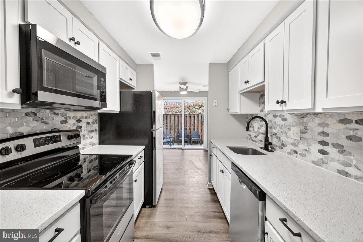 Welcome home to this beautifully fully renovated townhome that perfectly blends modern style with everyday comfort.  Ideally located near major commuting routes, this home offers easy access for work and travel while keeping you close to everything you need. Enjoy the convenience of shopping, dining, and everyday essentials all within a mile, making errands and nights out effortless. 
The stunning kitchen features new stainless steel appliances, crisp white cabinetry, a large pantry for ample storage, and sleek quartz countertops that complete the fresh, contemporary design. Luxury vinyl plank flooring flows throughout the main level, creating a seamless feel between the spacious living and dining areas. A sliding glass door fills the space with natural light and opens to your private patio—perfect for relaxing or entertaining.
Upstairs, you’ll find brand-new carpet on the stairs and in the bedrooms, offering warmth and comfort. The fully remodeled bathroom showcases modern finishes, including a unique lighted faucet that adds a fun, stylish touch.
The mostly finished basement provides additional living space with small windows that allow natural sunlight to filter in—ideal for a family room, home office, or gym. This unit also includes a 1 car garage.
Additional updates include a brand-new washer and dryer and a new HVAC system, giving you peace of mind for years to come.
This move-in ready home offers modern updates, functional space, and effortless living—schedule your showing today!