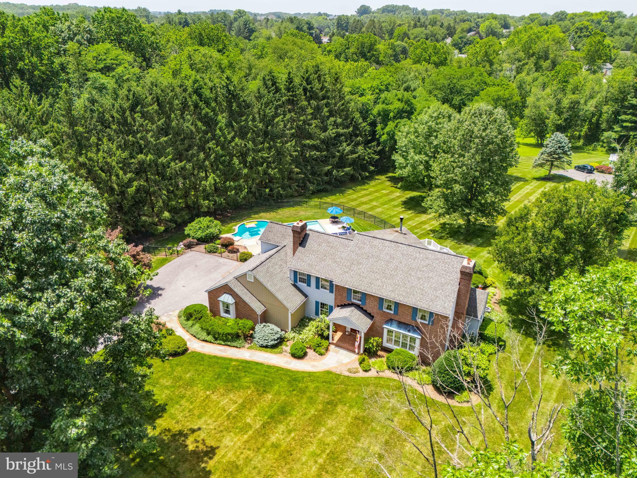 Make your appointments now! Open Saturday 12-2 pm.
Welcome to this immaculate Custom home 1.5 miles from Jacksonville/Four Corners, with a gorgeous pool, on a quiet court in Baldwin. 4 bedrooms, a main floor office, and a bonus "guest room" in the LL, make this an inviting home that is perfect for gatherings, Holidays, and more. The home, has a terrific flow, and  was thoughtfully designed with quality construction. 
The wide open Foyer with a curved staircase leads to the Formal Living room and Den.
A Kitchen/ Family room addition is the heart of the home with a wall of windows overlooking the Timbertek deck, Lothorian pool, Spa,  and backyard. The whole home is light filled and bright featuring Anderson and Pella windows. 3 fireplaces offer cozy and elegant spots for gathering and relaxation. 
The Kitchen features expansive counter space, a walk in pantry with wood shelving, bar seating, plenty of cabinetry and storage for all your entertaining items, and adjoins  the open Family room with ease. there is plenty of table space and a gas fireplace. 
The Formal Living and Dining rooms with crown  moldings and millwork make this a super entertaining spot for all the Holiday events.
The Den is very inviting with a raised hearth brick  wood burning fireplace, beamed ceiling,  built in cabinetry and a wet bar. 
The main level also offers an additional Office with built-in desk and cabinets, 2 half baths, and a walk-in coat closet near the garage entrance.

The Primary suite features a large bedroom, walk-in closet and renovated bath with soaking tub, twin vanities, and separate tiled shower. The other 3 bedrooms are all generously sized, bright and cheery with plenty of closet space.  The laundry is conveniently located in the Upper Hall bath.
The Lower level is completely finished with a huge open area featuring a pool table, plenty of room to play or work out, closets for storage, 2 additional  bonus rooms, and a full bath. The pool table is included.
There is a huge unfinished storage area perfect for all the pool furniture etc, accessed from the outside rear.
