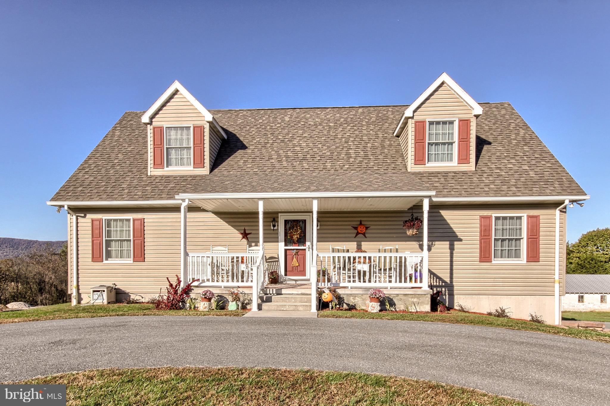 If you are looking for all of the amenities of a new home, as well as the country setting with plenty of land, this is the home for you! Gorgeous mountain views and overlooking views of Opossum Lake are just two of the many features that this home has to offer! With plenty of space for everyone, spread out in one of the five spacious bedrooms which includes two master suites, or curl up in the living room and watch the wildlife venture through your back yard. Full walkout basement could be finished for additional living space, and a fully drywalled oversized two car garage offers space and storage! Enjoy the large front porch for morning sunrises, or the rear deck for evening sunsets. With so many wonderful amenities, do not miss out on making it your own!