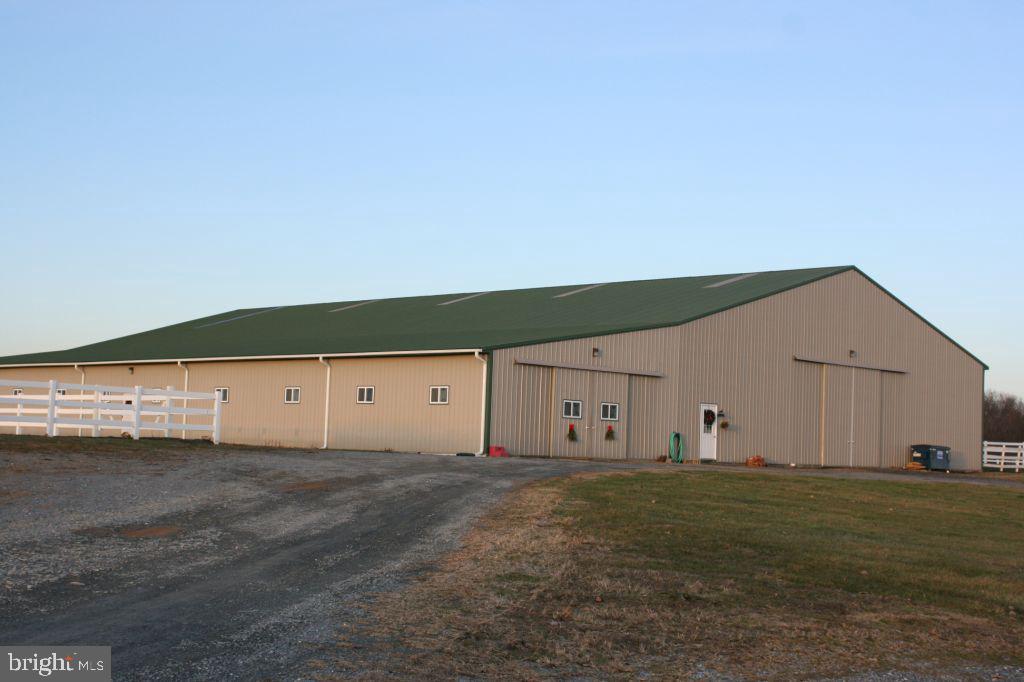Top Noth Equestrian faculty on 15.77 acres.  Including 80x160 indoor arena, 20 horse stalls, Office, 3 tack rooms with 1 with laundry hookup, 2 wash racks.  Large outdoor riding ring and additional round training pen. 5 large pastures for grazing.  Property includes .82 building lot for residential use.  Property is serviced by public water and sewer and natural gas.  Close to Route 30, Lancaster, York and Harrisburg.