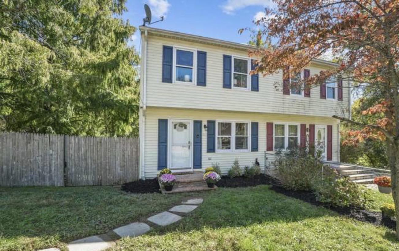 This charming twin home offers a perfect blend of traditional style and modern comfort. With approximately  1,530 square feet of living space, this residence features three inviting bedrooms and one and a half bathrooms, making it an ideal step-up or starter home for your buyers. Step inside to discover a warm and welcoming atmosphere, highlighted by a traditional floor plan. The cozy breakfast area is perfect for enjoying morning coffee on the deck or casual meals, while the living areas provide ample room for gatherings and entertaining. The fully finished basement offers additional space for recreation, a home office, or a cozy den. Outside, the deck provides a serene spot for outdoor dining or simply soaking in the fresh air, while the yard is perfect for you to use your imagination to redesign a garden or play area. Convenient off-street parking and an asphalt driveway ensure easy access, while a shed offers extra storage for your outdoor equipment. This home is ready for buyers to move right in and start making memories. Easy access to shopping, 15/340, West Virginia, the canal, and lots of outdoor activities.