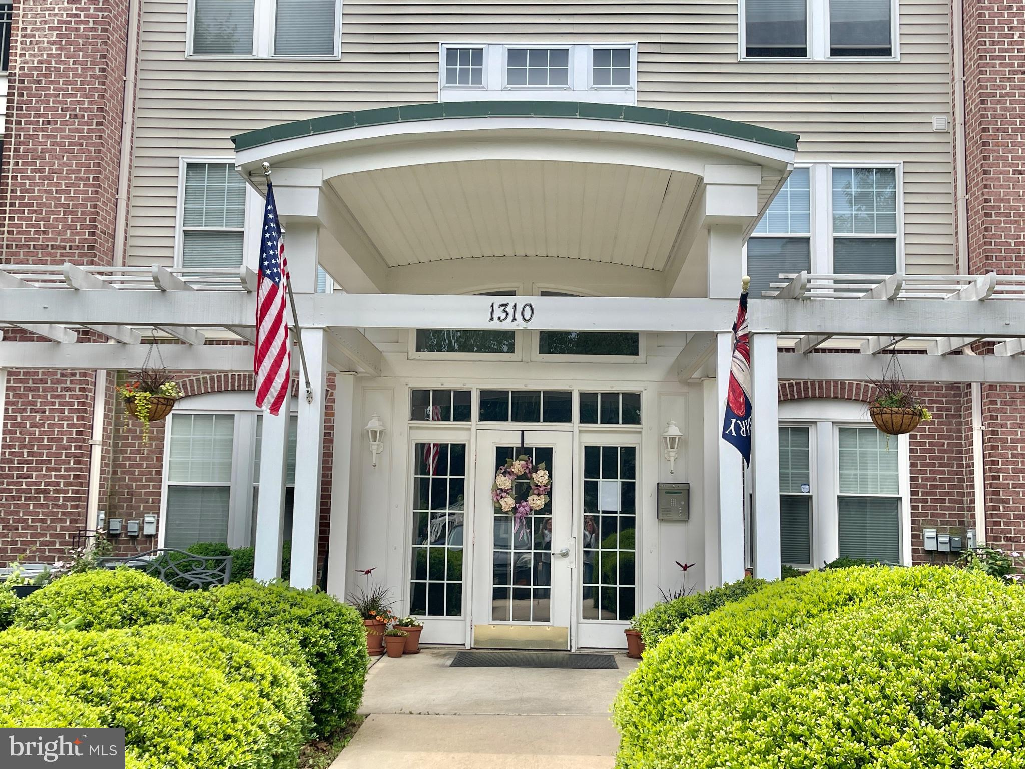 Nestled in the serene community of Green Haven, this 2-bedroom, 2-bathroom, built in 2000, is in excellent condition that invites you to experience its charm. Step inside to discover an open floor plan that seamlessly connects the living, dining, and kitchen areas, creating an inviting atmosphere for both relaxation and entertaining. The family room, adorned with crown moldings and chair railings, features a cozy gas fireplace, perfect for those chilly evenings. Large windows drench the space in natural light, while elegant window treatments add a touch of sophistication. The kitchen is a culinary enthusiast's dream, equipped with stainless steel appliances, including a built-in microwave, electric oven/range, and dishwasher. The eat-in kitchen design allows for casual dining, while the dining area is ideal for sit down dining. Retreat to the primary suite which includes its own private full bath, walk in closet and brand new carpet!. The second bedroom is equally spacious, offering versatility for guests or a home office. Enjoy the convenience of in-unit laundry with both washer and dryer included.  Step outside to your private patio, perfect for enjoying morning sunrises or evening gatherings. The community amenities elevate your lifestyle further, featuring a sparkling outdoor pool, tennis courts, and a community and fitness center.
