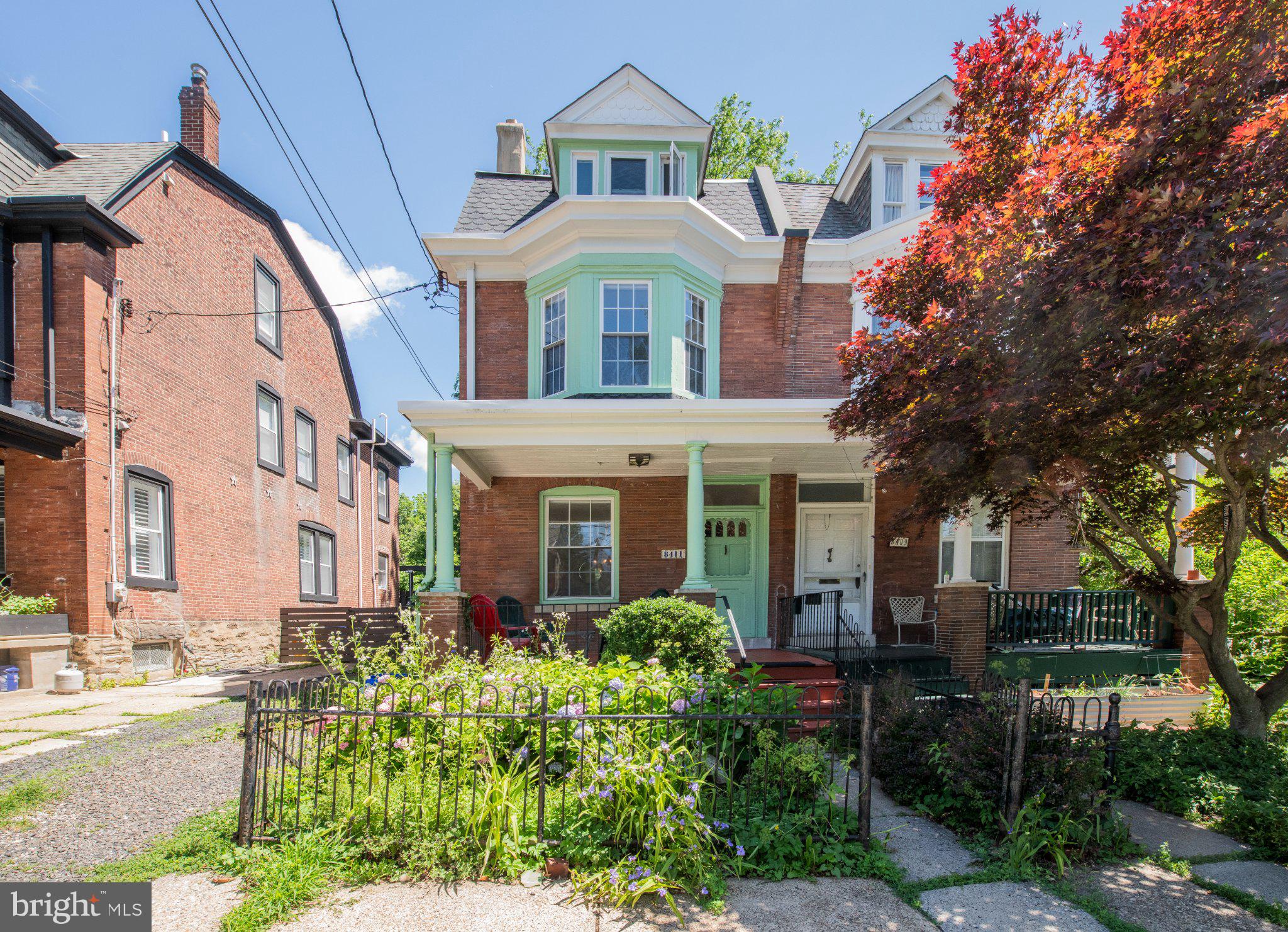 Prime Chestnut Hill location on sought-after Shawnee Street — just moments from the shops, restaurants, parks, and transportation along Germantown Avenue, yet tucked into a peaceful residential setting.

This spacious 5-bedroom, 1-bath twin blends historic character with everyday convenience and includes off-street parking.

A covered front porch offers a welcoming place to relax, gather with friends, or enjoy the surrounding greenery. Inside, the entry hall showcases original millwork, built-in bookshelves, and a decorative non-working fireplace that reflects the home’s historic charm. The staircase leads to the upper floors, while the adjoining dining room features an original corner china cabinet along with additional storage and coat closets.

At the rear of the home, the kitchen retains an original built-in sideboard, providing both character and functional storage—a thoughtful detail of early 20th-century craftsmanship. The adjoining mudroom includes a hook up for a washer and dryer and access to the rear yard.

The second floor offers three bedrooms and a hall bath with a tub, handheld shower, porcelain sink, and shelving. Two additional bedrooms are located on the third floor, along with a cedar hall closet.

The full unfinished basement houses the boiler and oil tank and provides additional storage potential.

Conveniently located near the shops and dining of Germantown Avenue, Pastorius Park, the trails of the Wissahickon Valley Park, and public transportation, this home offers easy access to many of Chestnut Hill’s most popular amenities.