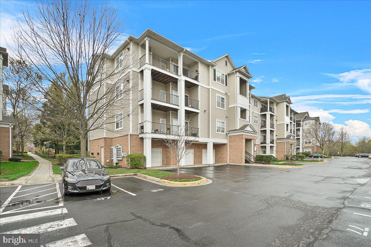 OPEN HOUSE: THIS SUNDAY (4/27) 12PM-2PM 

MOVE-IN READY!!!!Meticulously Maintained  2 Bedroom  2 Bath Penthouse in sought after Ashmore of Germantown. 1 OVERSIZED Car Garage PLUS 1 assigned parking space and 1 ADDITIONAL parking spot in-front of the garage. Panoramic Views from the Balcony that oversees the large POOL. Newer HVAC and Stainless Steel appliances. Large walk-in closets. Beautiful pendant light fixtures and crown molding throughout the home. Built-in bookshelves, cathedral ceiling, and lovely fireplace. Large Pantry. Minutes from Outlets, restaurants, and schools. POOL and GYM  included in amenities