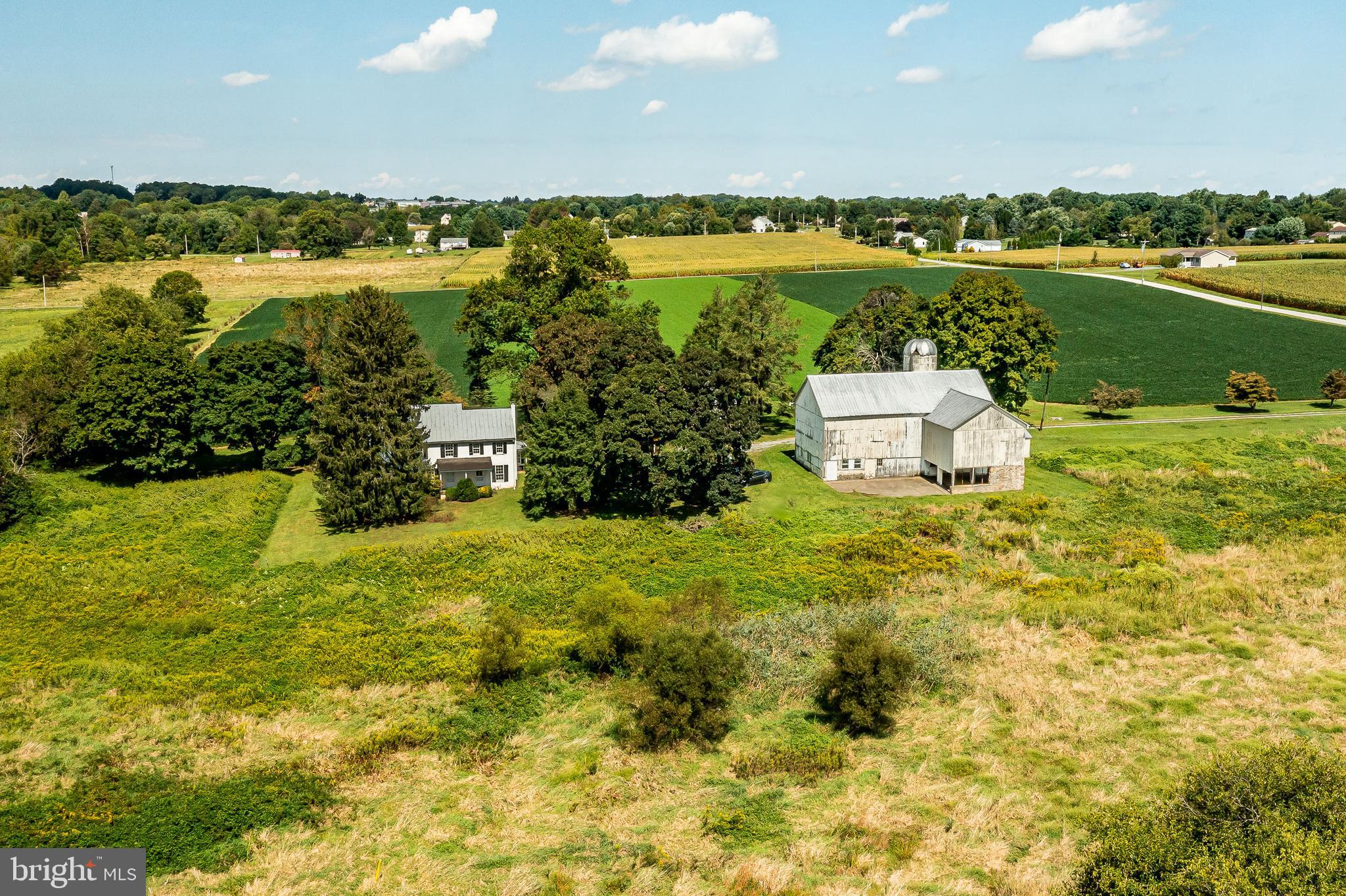 Coming soon, showings to begin November 3rd...Set on approximately 32 acres off a quiet country road and privately located down a long lane, sits this four bedroom, two and a half bath antique home that offers a special opportunity to create a fabulous equestrian farm or a superior gentleman’s estate. The gracious, light-filled home features generously sized rooms and period details throughout. The oldest section of the home dates to the mid-1700s with a mid-1800s section and a still later Kitchen and Family Room/Office addition dating from the 20th century. The large Living Room features an original fireplace with a period mantel. The adjoining Dining Room is conveniently located just off the Kitchen, with its plentiful counter space and bay windows. The south facing covered porch is a perfect location to relax and enjoy the farm’s bucolic vistas across protected meadows. Upstairs, all four bedrooms each have several windows, large closets, and original wood flooring. There are two full bathrooms. The two bay Garage has a large storage area on the second level that could be converted to a Home Office or other use. The large bank-barn features a spacious loft with post and peg construction and a lower level, once used for the farm’s dairy operation. Well priced and adjoining preserved farmland, this 3-parcel property offers a wonderful opportunity to live the epitome of a country lifestyle. Parcels included in sale: 58-6-2, 58-6-2.2, 71-2-14.1. See agent for details about pending subdivision, existing Wetlands Reserve Program Easement, and opportunity for an Agricultural Conservation Easement with the Chester County Agricultural Land Preservation Program.