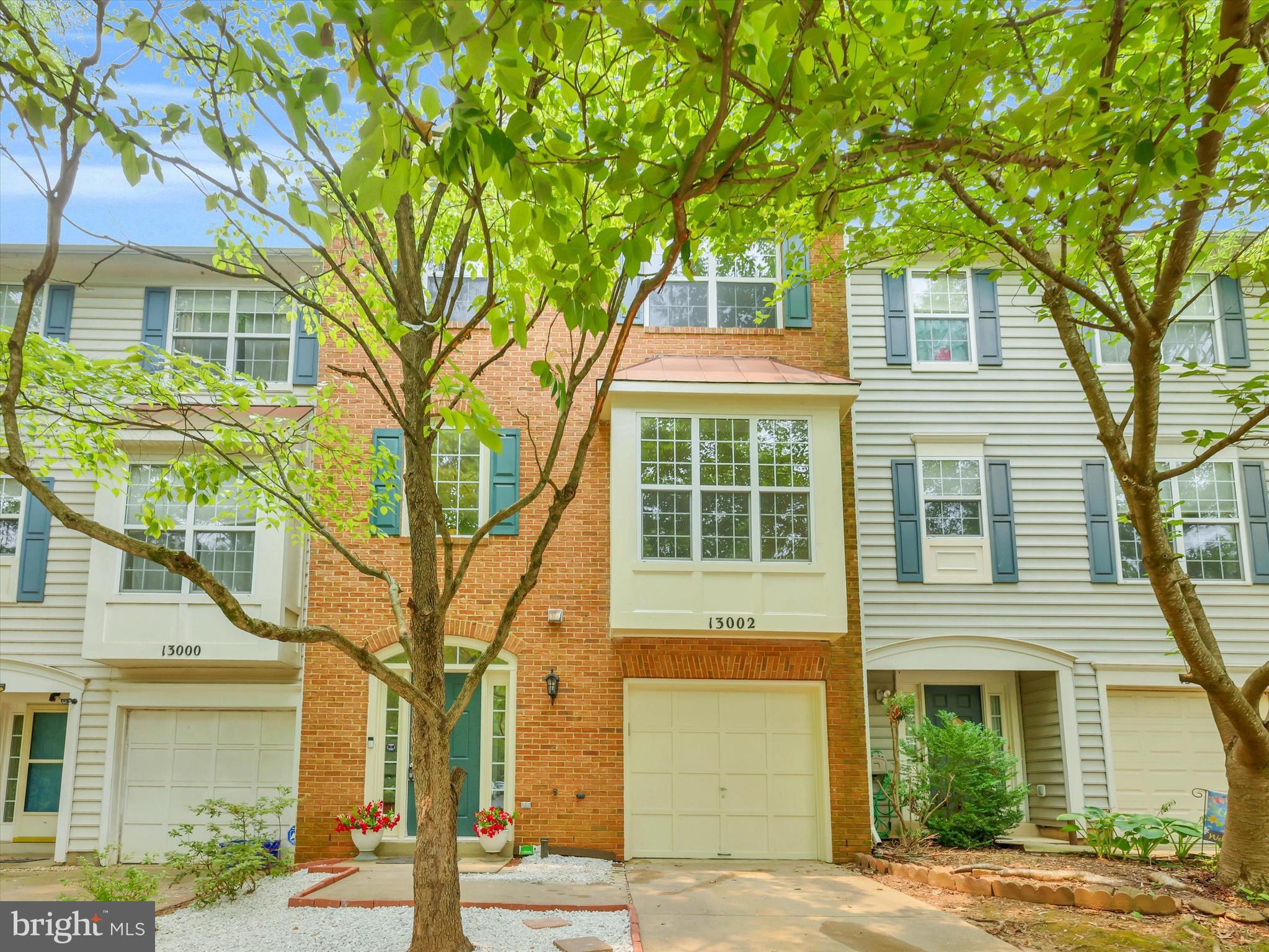 Welcome to this beautifully maintained, recently upgraded, spacious 4-bedroom townhouse offering the perfect blend of style, space, and convenience in highly desirable Germantown! Spanning three fully finished levels, this home features 2 full bathrooms and 2 half bathrooms, making daily living and entertaining a breeze.
Step inside to a fully finished lower level which adds incredible value and versatility.  Here you will find the expansive 4th bedroom,  which can easily double as a recreation room, home gym, or media center. This level also features  a fireplace and second convenient half bath, and direct walk-out access to the backyard.
Go up to the next level with bright, open-concept main floor designed for modern lifestyles. The spacious living and dining areas feature large windows that flood the space with natural light. The gourmet kitchen boasts ample cabinetry, quality appliances, and a seamless flow to the dining area—perfect for hosting family and friends. A convenient half bath completes this level.
The upper-level features three generously sized bedrooms, including a peaceful primary suite complete with its own private, full en-suite bathroom and excellent walk-in closet space. The two additional bedrooms share a second well-appointed full hallway bathroom, offering plenty of space for family, guests, or a secondary home office. This level also offers  a dedicated laundry area.
The most recent upgrades include newly replaced water-proof laminate flooring on top 2 levels.  This includes replacing all stairs with new laminates and refinishing the banisters to look refreshed.
This house offers ample parking with one-car garage,  as well as parking on the driveway outside the garage. The community also offers lots of visitors parking. 
Perfectly situated in Germantown, you are just minutes away from top-rated Montgomery County schools, shopping, dining, and entertainment at the Germantown Town Center. Commuters will love the easy access to I-270, Route 355, the MARC train, and nearby park-and-ride lots. Enjoy the outdoors with Black Hill Regional Park and local neighborhood North Germantown Greenway Trail is just a short drive away.
Don't miss the opportunity to make this beautiful townhouse your own!