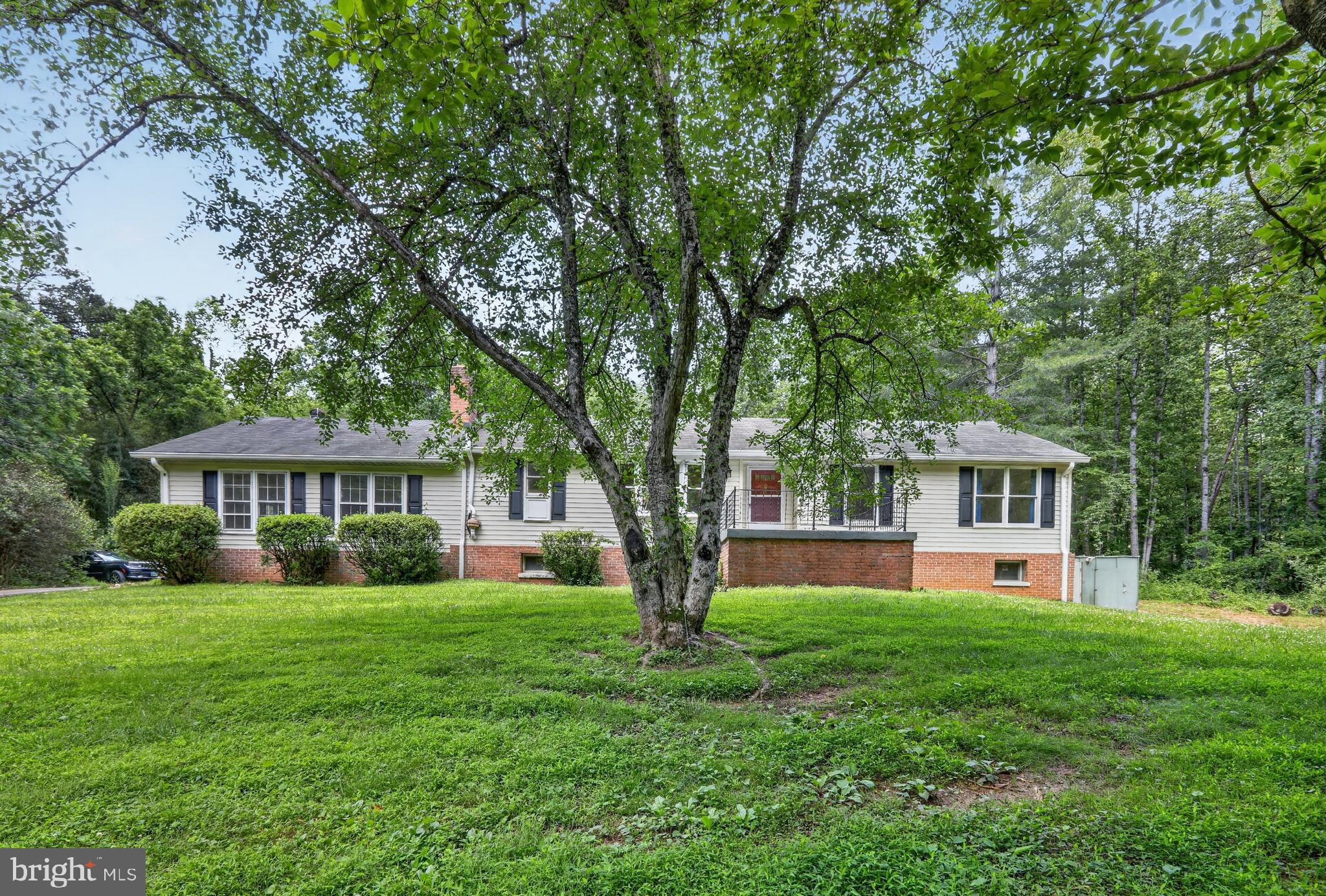 Over 5 acres of open space, a spacious primary suite, and a layout that gives you room to live your way.
With just under 6 acres to spread out, you have the freedom to shape the property around your lifestyle! Step into a 3-bedroom, 2-bath layout that offers generous room sizes and ample opportunity to expand.  Fresh paint, brand-new carpet, updated laminate flooring, and recent landscaping give you a solid starting point while still leaving room to personalize over time. There is a massive flex space with vaulted ceilings and tons of natural light and a charming screened in porch off the living room. 
The kitchen is set up for everyday use including an eat in bar and kitchen nook with a bay window to watch the deer pass by.  The primary bedroom comes with space for a sitting area and ample closet storage. The other bedrooms are flexible for your guests, work-from-home needs, or hobbies.
The walkout basement is another layer of opportunity that you can use for storage now or decide to finish it into an extra living space down the line. Relax and take in the surrounding landscape from the freshly screened in back porch.
The home is just off Waterloo Road with quick access to Route 211, making it easy to head into Warrenton or Culpeper in minutes. Nearby conveniences and access points toward the Rappahannock River and the surrounding countryside give you both accessibility and a more rural setting at the same time.
This home is being offered as-is, a chance to step into acreage, space, and a strong foundation while making it your own over time.
If you’ve been looking for land, privacy, and a layout that gives you flexibility without sacrificing access to town, this is a property you’ll want to see in person.
Some images may reflect virtual staging or digital editing, including removal of personal property, to help showcase the home.