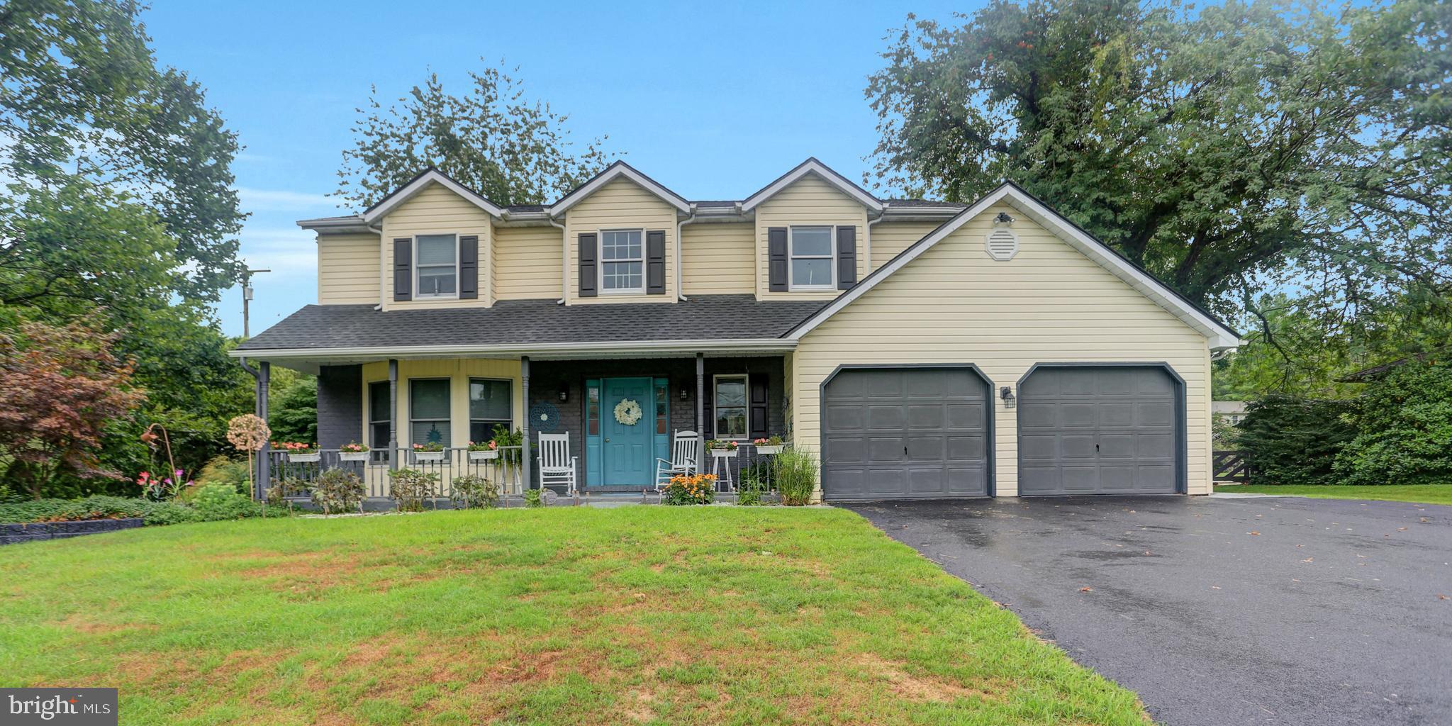 ABSOLUTELY  GORGEOUS!   This Colonial style home has something for everyone.  With over 3000 sqft of living space it's equipped with an open floor plan on main level with french doors leading out to large private  sunroom.  Spacious eat-in kitchen, formal dining room, large family room with fireplace. Additional living room/bonus room set up as guest room on main level & half bath.  4 bedrooms upstairs with 2 full baths.  Fully finished  basement, 2 car garage with floored attic above. Private back yard with deck and patio, mature trees, plenty of parking and centrally located in South Guilford Hills.  New roof 2020. Call today!