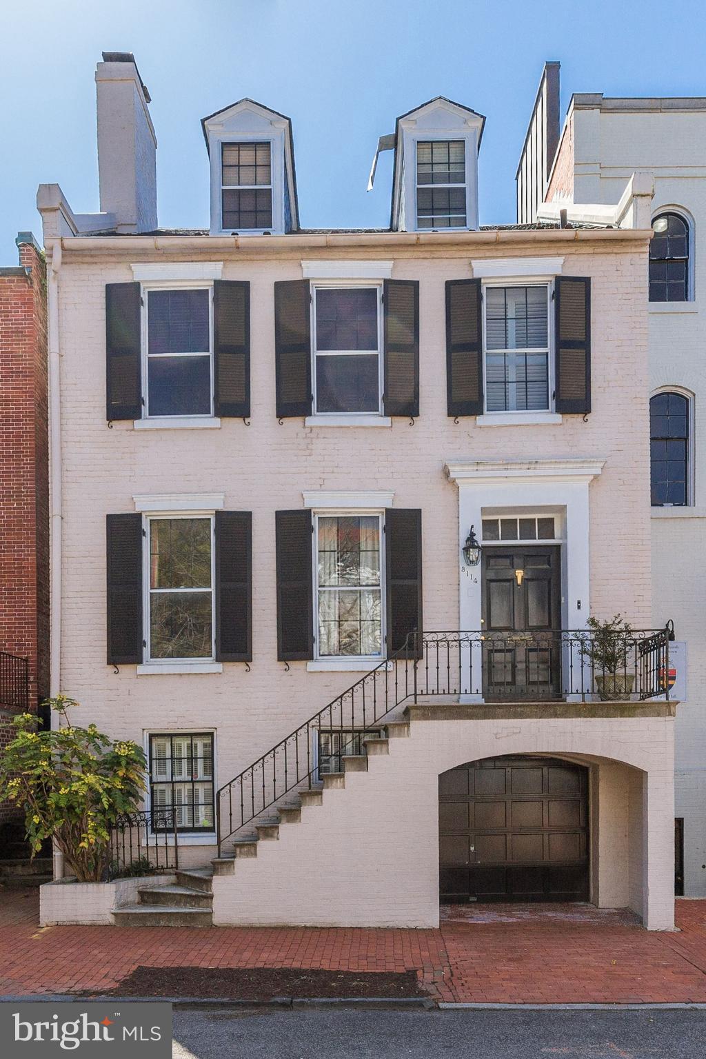 Incredibly charming 4BD/3.5BA Federal home that sits high on O St. in the East Village. Large living room with two fireplaces, a spectacular private brick garden, that floods the interior with natural light throughout the day. Stunning wide plank hardwood floors throughout. Attached GARAGE one-car PARKING.