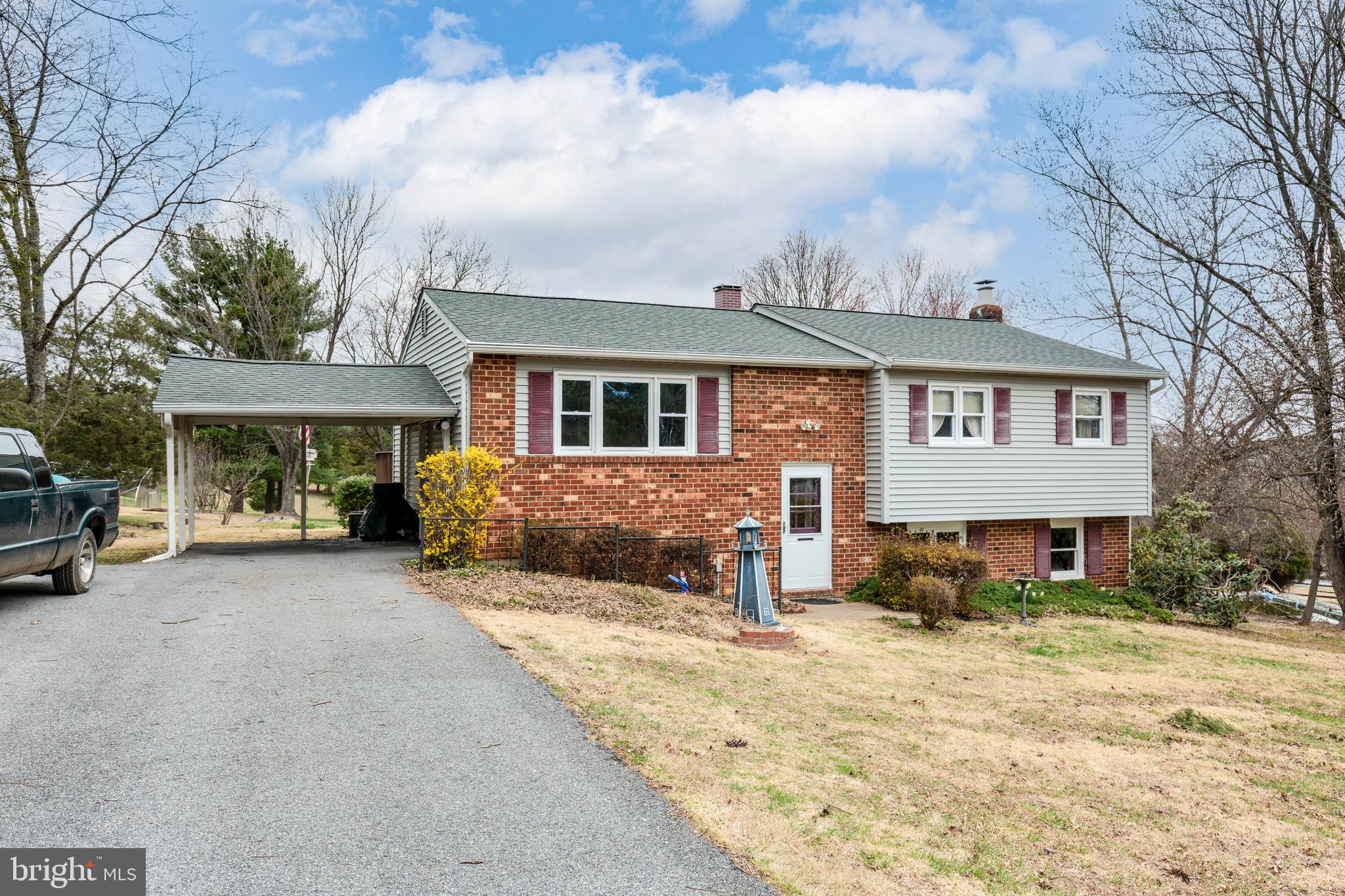 What a great home! The original owner has lovingly cared for this home and it shows.   The 3 BR, 2 full and 1 half bath makes it the perfect size! There is a nice sized deck off of the kitchen that overlooks the large private back yard and a second deck off of the primary bedroom with your own hot tub! Huge family room with a walk out to the back yard.  The lower level has so much light because of the full windows and the walk out. The lower level also offers a pellet stove and a huge storage room.  This home has a carport and a shed.  New roof, gutters, and downspouts done in 2016. New siding in 2012.  This home has it all and I can't wait to show it off! Call today to schedule a showing!
