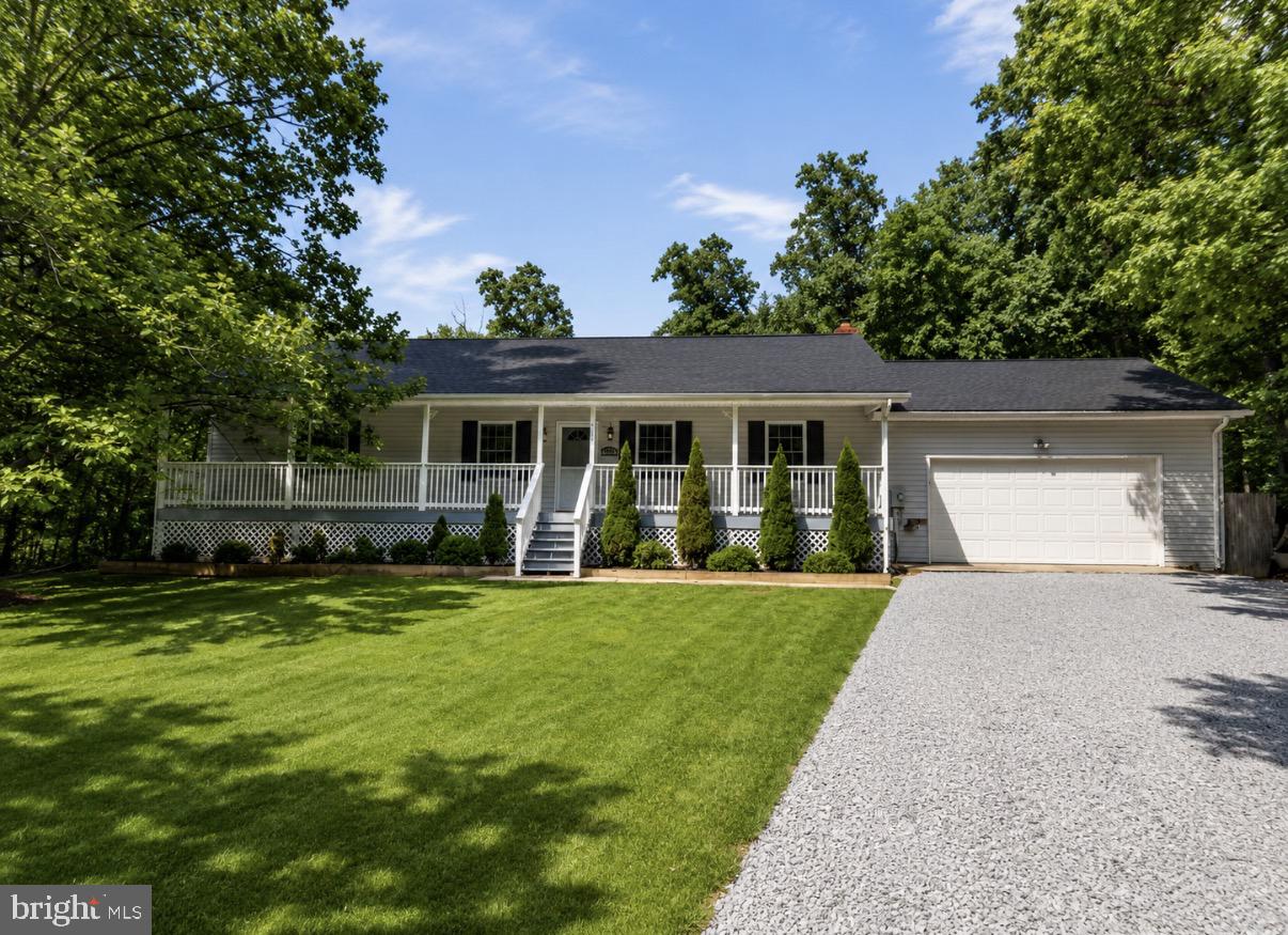 Beautifully maintained rancher offering nearly 2,400 finished square feet in the desirable Gate 1 section of Shannondale. Situated on a level, fenced lot with no HOA, all paved road access, high-speed internet, and an attached 2-car garage, this property combines convenience, comfort, and flexibility.

The main level features hardwood flooring, a spacious living room filled with natural light, an open dining area, and a well-appointed kitchen with breakfast bar seating and ample cabinet space. The primary suite offers a private bath and generous closet space, while two additional bedrooms and a second full bath complete the main level.

The finished lower level expands the living space with a large recreation room, dedicated flex space ideal for a home office, gym, guest area, or potential 4th bedroom, plus a beautifully updated full bath featuring custom tile work and a soaking tub.

Enjoy relaxing on the covered front porch, entertaining on the rear deck, or spending time in the private fenced backyard surrounded by mature trees. A storage shed provides additional space for lawn equipment, tools, and outdoor gear. Recent improvements include a roof and HVAC system replaced in 2020, a Culligan water treatment system, and a newer hot water heater.

Conveniently located near commuter routes with easy access to Northern Virginia, this home is also just minutes from the Shenandoah River, Appalachian Trail, local hiking trails, and outdoor recreation, offering the perfect balance of everyday convenience and outdoor adventure.

Offering space, updates, and a highly sought-after Shannondale location, this move-in ready home is one you won’t want to miss.