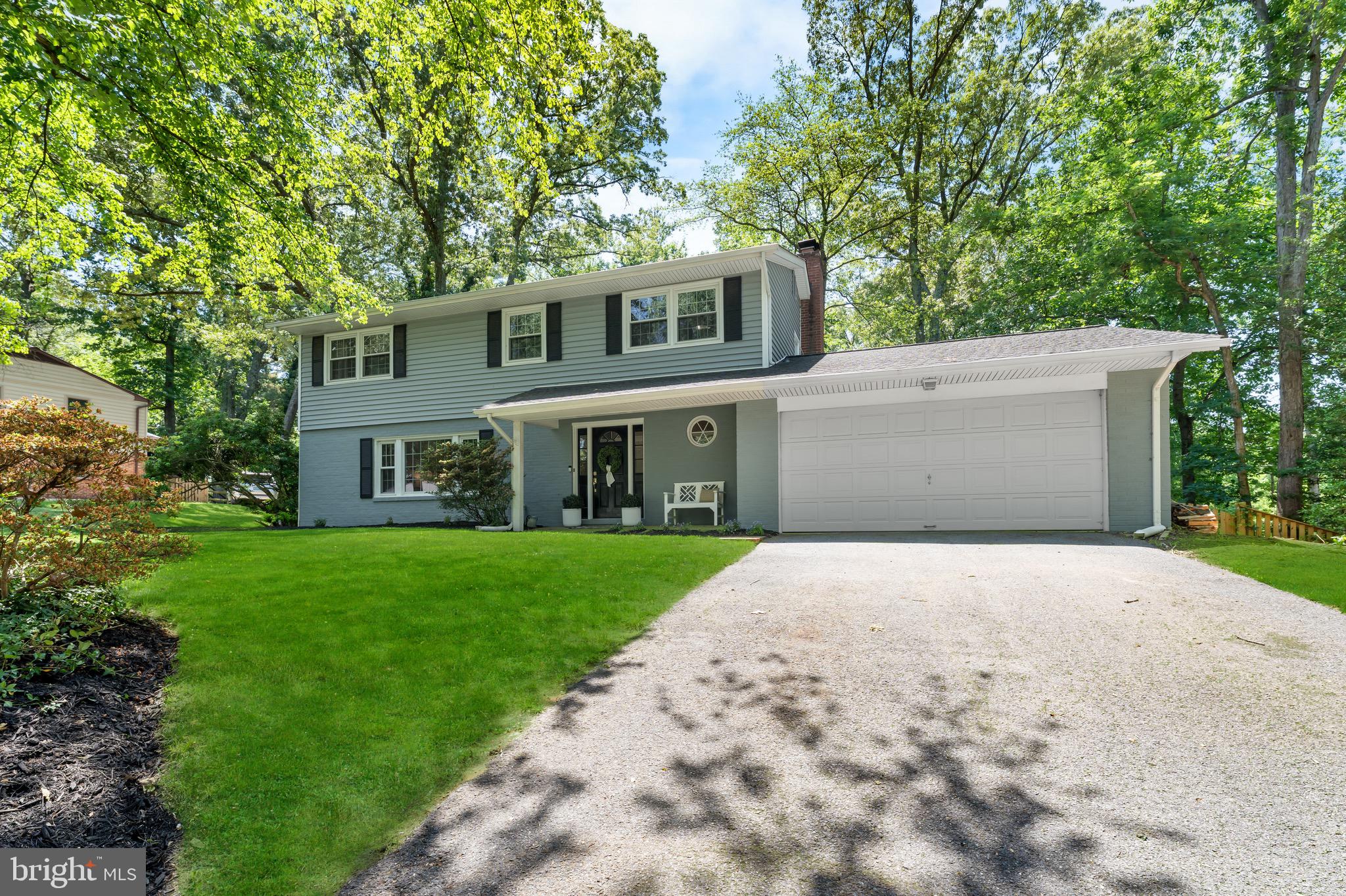 Located in the highly desirable Chartwell community, this beautifully updated colonial offers a refined blend of modern finishes, functional living spaces, and seamless indoor-outdoor living. The main level features a newly renovated kitchen ('24) with a large island and new cabinetry, quartz countertops, stainless steel appliances (range, dishwasher, mini fridge, microwave '24), and an open layout designed for both everyday living and entertaining. A versatile combination living and dining area provides flexibility for gatherings, daily living, or work-from-home needs. Off the kitchen, there is a  cozy family room with a wood-burning fireplace and an adjacent powder room. The upper level includes a spacious primary suite complete with a walk-in closet and a fully renovated en-suite bath featuring a walk-in shower. Three additional well-proportioned bedrooms share an updated hall bathroom with dual sinks, granite countertops, and a tub/shower combination. The lower level expands the home’s functionality with a large recreation room, a full bathroom with a shower, and two additional flexible spaces ideal for home offices, guest accommodations, fitness, or hobby rooms. A dedicated laundry area is also located on this level. The sellers are relocating due to an unexpected job opportunity; however, during their ownership they completed an extensive list of thoughtful improvements. Updates include a fully renovated kitchen, freshly painted exterior brick and interior paint throughout much of the home, creating a clean and cohesive aesthetic. Additional enhancements in the last two years include luxury vinyl plank flooring throughout the main level, upgraded lighting fixtures on the second floor, a new maintenance-free deck ('25), newly installed rear fencing ('25), and artificial turf, which contribute to a truly turnkey, move-in-ready experience. Ideally situated near sought-after community amenities, this home offers membership opportunities at both Chartwell Golf & Country Club and St. Andrews Swim & Tennis Club. Conveniently located near Benfield Elementary School and Severna Park Middle School, the home is also just minutes from Kinder Farm Park, known for its extensive trails, open green space, and farm animals. You do not want to miss this exceptional opportunity. Welcome home!