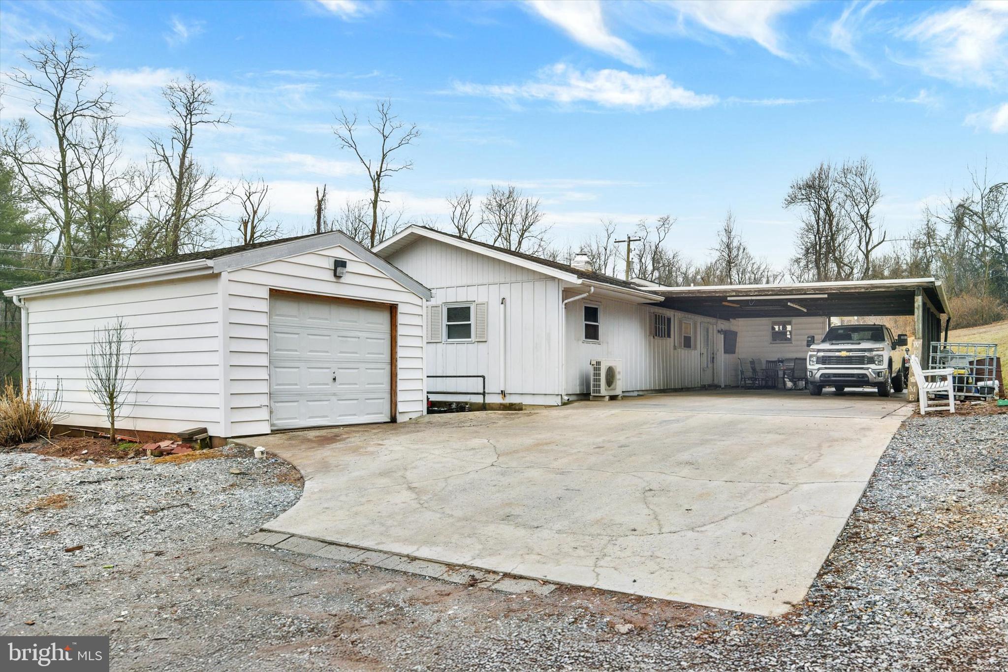 Opportunity awaits in the desirable West Shore School District! This 4-bedroom, 2.5-bath ranch home sits on over 10 acres, offering privacy and plenty of potential. The property features a spacious layout including a primary suite, hardwood floors, and an eat-in kitchen. A detached 1-car garage provides additional storage or workspace. The home is in need of repairs being sold as-is, and is priced accordingly, making it a great opportunity for buyers looking to build equity. Don’t miss your chance to own acreage in a prime location! Be sure to check with the township on subdivision possibilities as an investment opportunity.