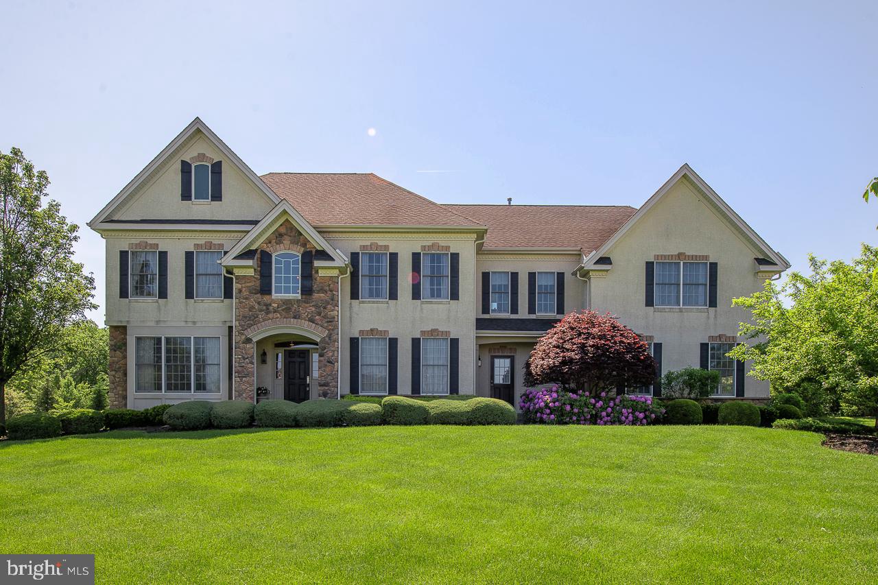 Foxhall Estates is a premier community located on a private cul-de-sac in beautiful Bucks County.  This impeccable property has bells and whistles combined with gracious living plus it is located at the end of the cul-de-sac!  Built by Orleans  Builders, this is the sought after Bellingham model with a very open and unique floorplan.  With over 6500 SF of comfortable living, this 5 bedroom, 4.5 bath Estate home offers lots of natural light, attention to detail, large private lot, and a custom lower level.  Main level offers 2 story open grand foyer anchored by formal living room and dining room, home office with built-in’s enclosed by glass French doors, 2 story family room centered by a gas fireplace and oversized picturesque windows bringing the outdoors in.  Adjacent to the family room is the spacious eat-in gourmet chef’s kitchen with Granite Island, high end appliances, beautiful cabinetry, custom dessert pantry and another spacious kitchen pantry.  Access to 3 car garage, powder room, main level laundry.  Hardwood floors throughout and in pristine condition.  Second level offers a luxurious Master bedroom suite with his/her walk in closets, Jacuzzi, glass enclosed shower and incredible outdoor views from oversized windows.  Four additional family sized bedrooms with 2 additional baths and lots of abundant closets and storage space complete this level.  Walk-out Lower level is a huge WOW!  Renovated in 2011, you will find a Custom home theatre, custom cedar closets, custom bar, and amazing yoga/gym area, full bath, and so on…this is an entertainment space like no other and will seal the deal.  This meticulous home offers 2 zone heating/cooling, surround sound system throughout and a huge backyard to continue to entertain, install the pool of your dreams or whatever your heart desires.  Close to Newtown borough's great restaurants, shops, theatre and parks.  Located to all major highways, and the rail system, which makes commuting to Philadelphia, Princeton, NJ and New York City a breeze..