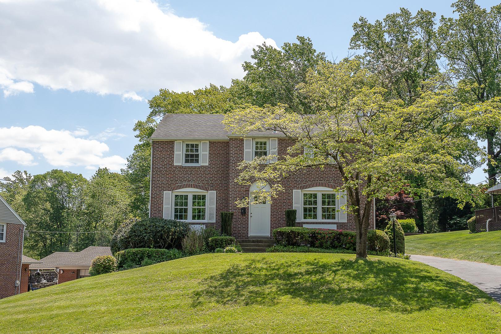 Welcome to 674 N Bishop Ave, this brick Colonial in Springfield offers classic curb appeal, a long private driveway, and a deep backyard with flexible outdoor space. The main level features a large, light-filled living room, a formal dining room, and a comfortable kitchen ready for everyday use. Three bedrooms and one full bathroom are located upstairs, creating a practical layout with traditional Colonial character. Each of the bedrooms are a nice size with hardwood floors. The finished lower level adds usable bonus space with room to refresh, plus laundry, mechanicals, and plenty of storage. Recent improvements include replaced front and back doors along with several recently replaced windows. The oversized backyard is a standout, offering space for gardening, play, entertaining, or future outdoor plans. Roof was replaced in 2017, HVAC 2021 and Hot Water Heater 2010.  It is close to public transportation, numerous parks, the reinvigorated Saxer Avenue business and entertainment district, and the sought after Springfield School District. With its perfect blend of classic charm and modern conveniences, this residence is truly a place to call home.