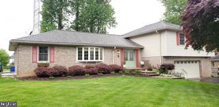 Welcome to this beautiful home, where the sellers’ pride of ownership shines throughout. This spacious property features 4 generously sized bedrooms and 3.5 bathrooms in the main home, plus a separate in-law suite complete with an additional large bedroom and a handicap-accessible full bath.
Recent updates include a new roof and a hot water heater that is only three years old. As you enter, you are greeted by a large foyer with two coat closets for added convenience. The kitchen is a standout feature, offering beautiful custom cabinetry with unique pull-out storage solutions, granite countertops, newer stainless steel appliances, and hardwood flooring that extends throughout most of the home.
The main level offers comfortable and functional living spaces, including a family room with a gas fireplace, main-level laundry, an eat-in kitchen, and a separate formal dining room. Upstairs, you’ll find four spacious bedrooms, including an impressive owner’s suite featuring a wall-length mirrored closet and a large private full bath.
The lower level is perfect for entertaining, complete with a full wet bar and full bathroom. Step outside to your own private oasis featuring a screened-in porch, hot tub, large pond with pump, and a stamped concrete patio with custom curved steps leading to the side kitchen entrance. A charming wooden plank walkway on the opposite side of the home leads to the front yard. Additional exterior features include two separate sheds, both equipped with power and lighting. The garage is truly a mechanic’s dream, offering abundant storage for tools and equipment, a laundry tub, and two kegerators plus a compressor that will convey with the property. Professional photos coming soon.