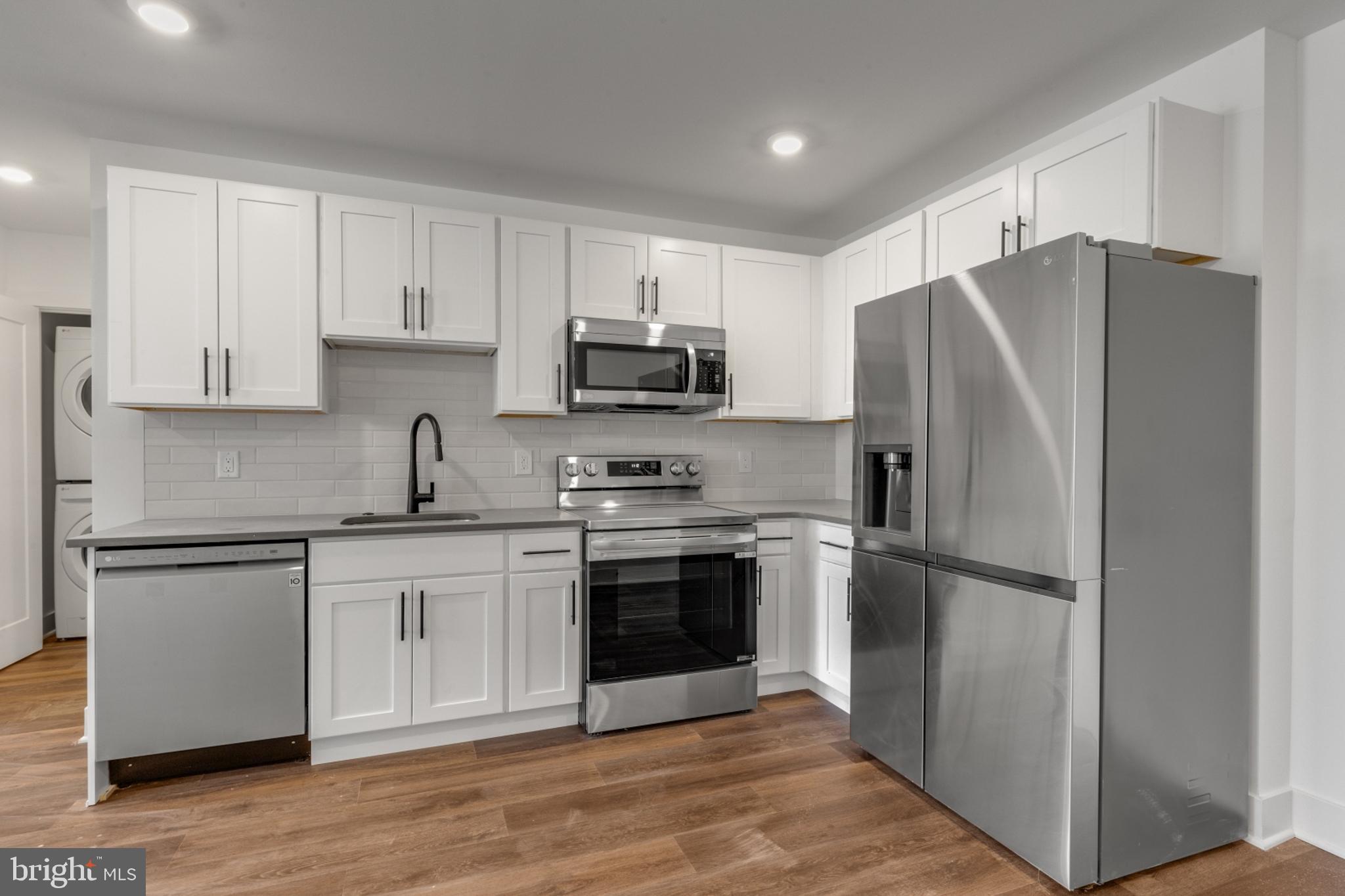 Available NOW | Leasing Special: 1 month FREE on a 13-month lease! Gross rent is $1,475/month - listed rent of $1,361/month reflects leasing special. 

Step into a world of modern luxury with these beautifully designed units, tailored to enhance your well-being. Bathed in natural sunlight, each open floor plan showcases sleek finishes and thoughtful details. Unit #205 is a 1 bedroom, 1 bathroom apartment located on the second floor. The ductless mini-split A/C ensures year-round comfort, while the convenience of in-unit laundry adds ease to your daily routine. Gleaming hardwood floors and recessed lighting flow throughout, creating an inviting atmosphere. The gourmet kitchen, featuring stainless steel appliances and abundant cabinetry, is perfect for culinary adventures. Spacious bedrooms offer a peaceful retreat, complete with ample closet space and sliding doors. Pamper yourself in the luxurious ensuite bathrooms, with stylish tiling, lighted vanities, and sleek bathtub-shower combos. This professionally managed building is ready to welcome you home—don't miss this opportunity! Please note: Photos & video tour may be from a similar unit; exact layouts and finishes may vary. Leasing special details: Tenant to receive a credit upon move-in to use how they choose during the lease term. Listed rent reflects leasing special. Leasing specials are for new residents only.

Lease Terms:

Generally, 1st month, 12th month, and 1 month security deposit due at, or prior to, lease signing. Other terms may be required by Landlord. $55 application fee per applicant. Pets are conditional on owner's approval and may require an additional fee, if accepted. (Generally, $500/dog and $250/cat). Tenants responsible for: electricity, cable/internet, and a flat water fee ($35 for 1 bed & $55 for 2 bed). Assigned off-street parking is available for an additional $295/month. Landlord Requirements: Applicants to make 3x the monthly rent in verifiable net income, credit history to be considered (i.e. no active collections), no evictions within the past 4 years, and must have a verifiable rental history with on-time rental payments. Exceptions to this criteria may exist under the law and will be considered.