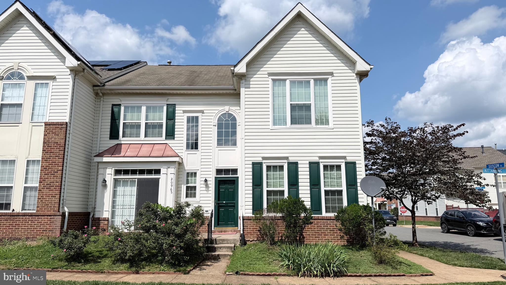 Welcome to this beautifully maintained, extra-wide end-unit townhome that lives like a single-family home, located in the highly sought-after Ashburn Village community. Offering over 2,285 square feet of above-grade living space across two levels, this spacious 3-bedroom, 2.5-bath residence blends comfort, functionality, and an exceptional lifestyle.

A dramatic two-story foyer sets the tone, leading into a light-filled interior featuring hardwood floors, elegant 9-foot ceilings on the main level, custom wood and double honeycomb blinds, and abundant natural light throughout. Many windows have been upgraded to triple-pane for enhanced energy efficiency. Both the front and rear doors are equipped with screen doors, allowing for convenient natural light and enhanced airflow throughout the home.

The well-appointed kitchen includes granite countertops, gas cooking, white appliances, and ample cabinetry with updated soft-close hardware. It flows seamlessly into the main living and dining areas, making it ideal for both everyday living and entertaining.

The expansive primary suite features a sitting area, dual walk-in closets, and a large en-suite bath complete with a soaking tub, separate shower, and dual vanities. Two additional generously sized bedrooms share a full bath with a separate vanity area, offering both privacy and convenience.

Additional highlights include an attached two-car garage and a spacious third-floor attic, perfect for storage or future customization. The attic includes an additional layer of insulation for enhanced energy efficiency. Major systems include gas heating and a gas water heater for efficient year-round comfort.

Outdoor spaces offer great potential: the rear door opens to an unfenced backyard near the garage, ready for your personal touch. The front-facing breakfast nook overlooks a garden area, while a large community green space just across the road provides a perfect setting for picnics, play, and safe biking along nearby walkways.

Situated in a quiet, family-friendly neighborhood, residents enjoy access to the Ashburn Village Sports Pavilion, featuring indoor and outdoor pools, fitness centers with sauna and steam rooms, tennis courts, and more. The community is also known for its scenic lakes, walking and biking trails, playgrounds, and strong sense of community.

Conveniently located near top-rated schools, major commuter routes, the W&OD Trail, Dulles Town Center, One Loudoun, and Ashburn Village Shopping Center, this home offers the perfect blend of tranquility and accessibility.

Available now to make it your own.