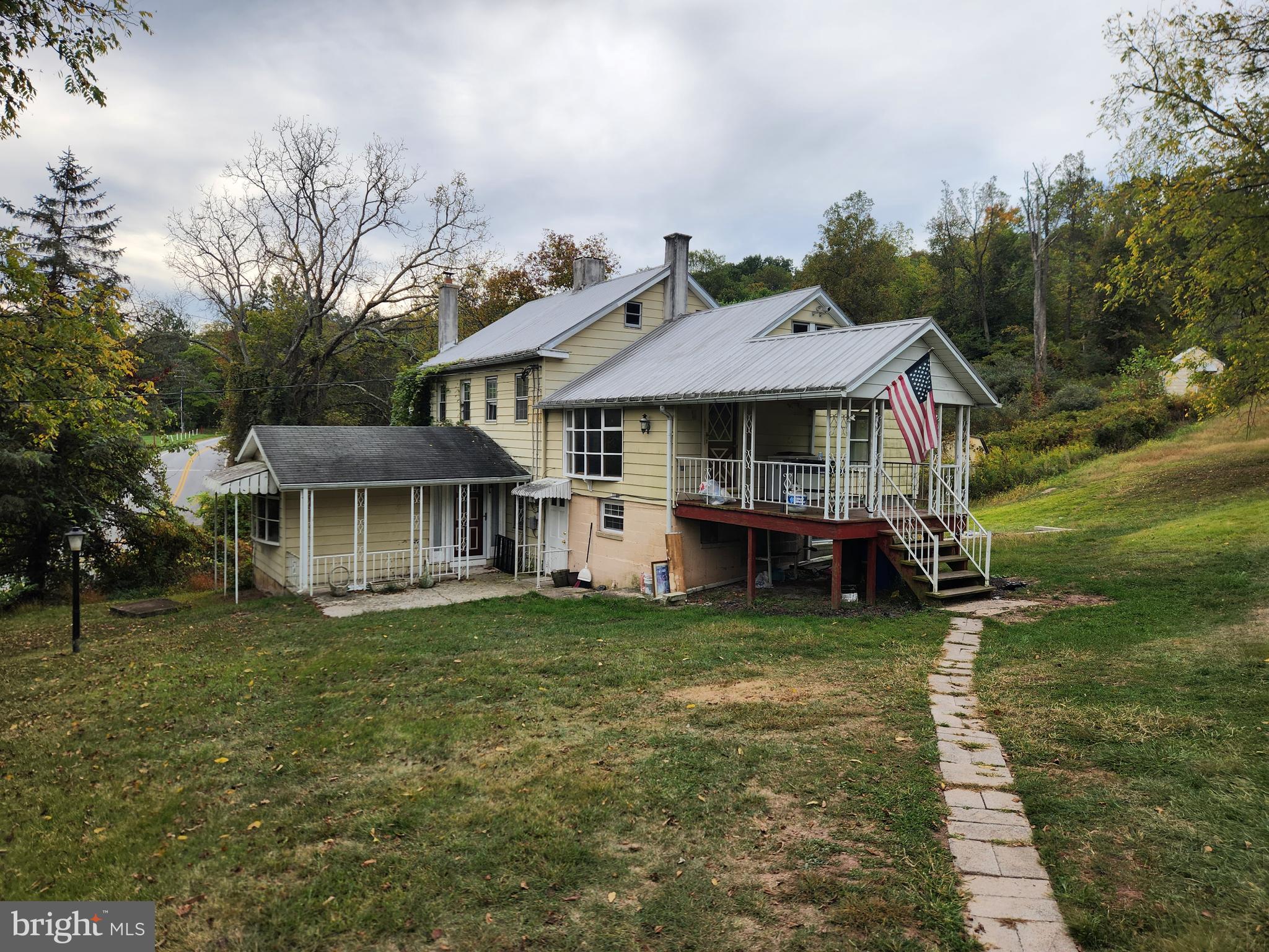 Bring your vision and creativity!  1,952 sq. ft. home  on 48+ acres with 2 two car garages, a barn and multiple outbuildings. Most recently used as a two unit (1 bedroom unit and 2 bedroom unit) rental property with both units having a full bath , kitchen, individual electric services and private entrances. This homes offers many possibilitily  as a primary residence, rental, or temporary housing during future construction or development.   Conveniently located with easy access to I-83, this 48-acre property is perfectly situated between Harrisburg and York. Offering beautiful views from multiple vantage points, the land provides a unique blend of privacy and accessibility from Pleasant View Rd or Ridge Rd. A little over 3  acres are zoned for single-family residential, with the remaining acreage zoned rural residential, making this an excellent opportunity for subdivision or future development. Public water is across the street and public sewer is on an adjacent property, adding to the property's potential.  The land is mostly wooded, except for open space around the home, and is enrolled in Clean & Green, keeping taxes low.  Seller will consider all offers!  See Bright Documents for additional information.