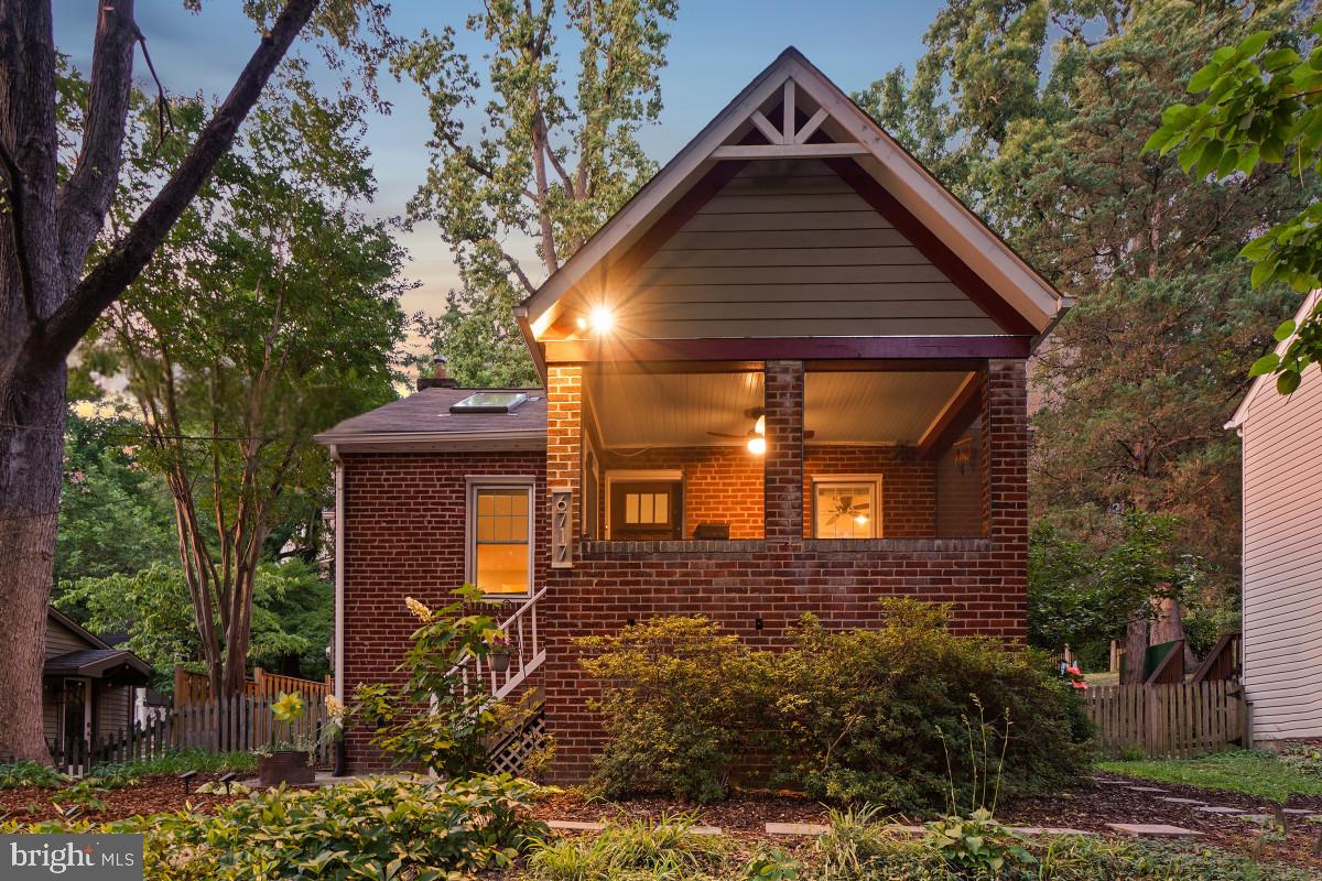 Welcome to 6717 Poplar Avenue, a beautifully updated all-brick Cape Cod nestled on community-oriented Poplar Avenue and just steps from everything downtown Takoma Park has to offer. Featuring an inviting front porch and a detached studio, this special property seamlessly blends timeless character with thoughtful modern updates. 

The covered front porch invites quiet mornings with coffee or evening chats with neighbors among the treetops. Step inside to an airy, open-concept living and dining area featuring soaring ceilings, a ceiling fan, and two skylights. The dining room has access to the large rear deck and a pass-through to the kitchen. The updated kitchen features quartz countertops, sleek stainless-steel appliances, and rich cabinetry with glass-front doors. The main level includes two bedrooms with ceiling fans and an updated full bath.

The finished lower level provides incredible flexibility, whether as a guest suite, family room, or separate in-law space. It includes a recreation space with recessed lighting and tile flooring, a renovated full bath, a versatile guest room or office, a laundry room, pantry, storage room, storage closet, and a private entrance. 
Out back, the fenced yard is your own garden oasis with mature landscaping, green grass, a stone patio with a brick paver retaining wall, and a large deck ready for summer gatherings. The incredible detached studio has electricity, a mini-split HVAC system, recessed lighting, a bay window, and a loft space. This space is perfect for a home office!

Located in eclectic, community-minded Takoma Park, this home offers more than just a residence. Enjoy block parties, Halloween parades, and the neighborhood's Turkey Fry tradition, all moments from the Takoma Farmer's Market, popular Spring and Forest Parks, Cielo Rojo, Busboys and Poets, Takoma Urban Park, and more!