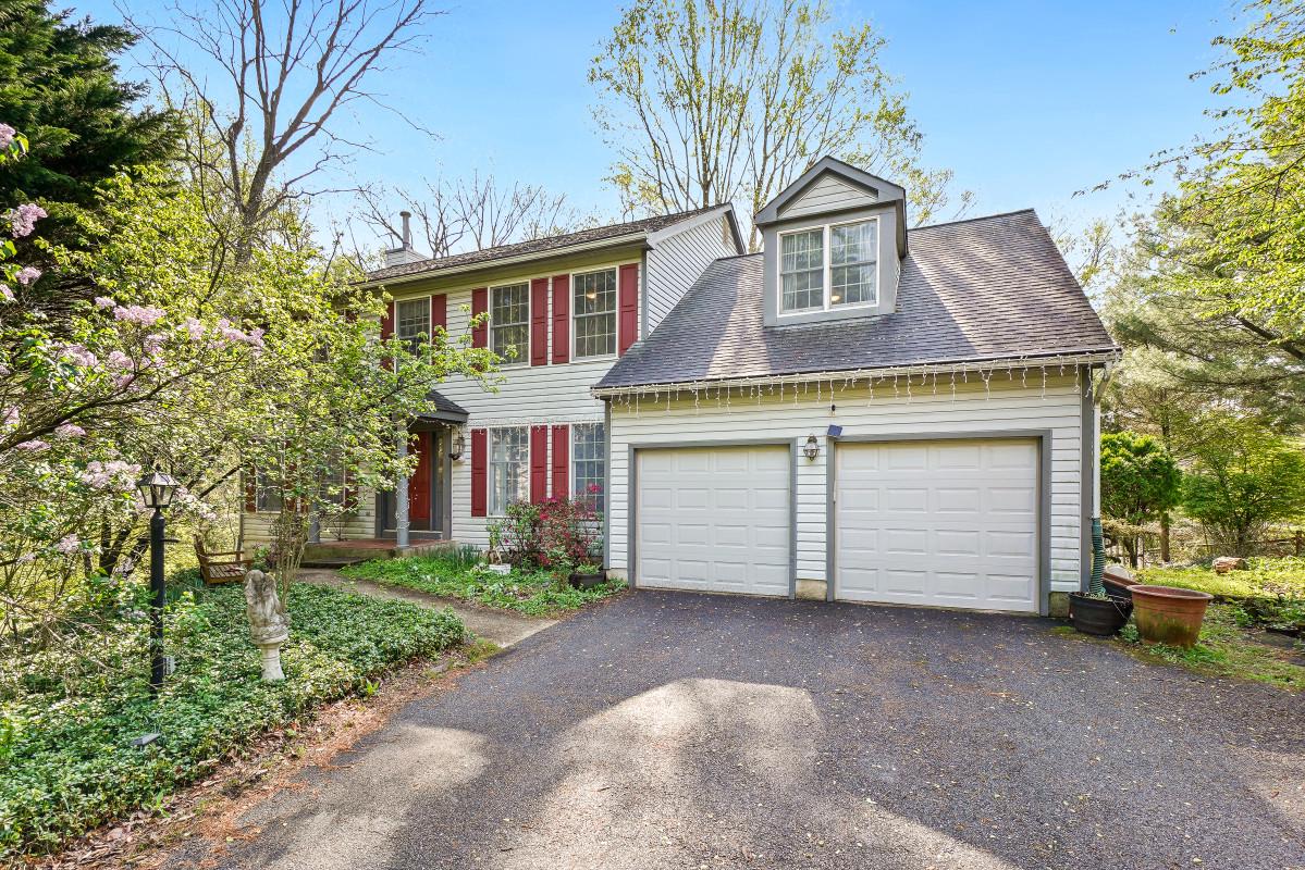 Nestled in the charming Valley Meade community, this stunning Colonial-style home offers a perfect blend of comfort and elegance. Thanks to the conservation area in the back yard makes the house quiet and in Summer, cooler about 5 degrees, not even mention the fresh air.
Built in 1992, this residence boasts a generous 3,615 square feet of living space, featuring six spacious bedrooms and three and a half bathrooms, making it an ideal retreat for those seeking room to grow. Step inside to discover a warm and inviting interior, highlighted by beautiful hardwood floors that flow seamlessly throughout the main level. The family room, conveniently located off the kitchen, creating a perfect space for gatherings and cherished moments. The eat-in kitchen is equipped with a gas range, refrigerator, and front-loading washer and dryer. An island provides additional prep space, while the separate dining room sets the stage for memorable dinner parties. Natural light pours in through bay and bow windows, enhancing the home's airy feel. Cozy up by the wood-burning fireplace in the living area, perfect for those chilly evenings. The fully finished basement offers additional living space, complete with a walkout level that leads to the serene outdoors. Outside, the expansive 0.59-acre lot is surrounded by lush trees and woods, providing a tranquil backdrop for relaxation or outdoor activities. Enjoy the fresh air on the spacious deck, ideal for summer barbecues or quiet mornings with a cup of coffee. Valley Meade is not just a neighborhood; it's a community that values connection and convenience. Residents enjoy easy access to local parks, perfect for leisurely strolls or picnics. The area is served by reputable schools, ensuring quality education for all ages. With nearby shopping and dining options, everything you need is just a short drive away. Public services in the area are top-notch, providing peace of mind and convenience for residents. The attached two-car garage offers ample parking and storage. Experience the warmth and comfort of Valley Meade living, where every detail has been thoughtfully designed for your enjoyment. *****************The following upgrades were made in 2019:

1. Kitchen and Laundry Room: stone tile flooring, range hood, and modern ceiling lights.
2. Master Bathroom: full renovation including a new shower, new vanity with a stone top, and a new toilet.
3. Main and Second Levels: solid hardwood flooring throughout the living room, dining room, four bedrooms, office, and hallway.

Additional updates include:
- Dishwasher 2024
- HVAC: 2013
- Gas Water Heater: 2014