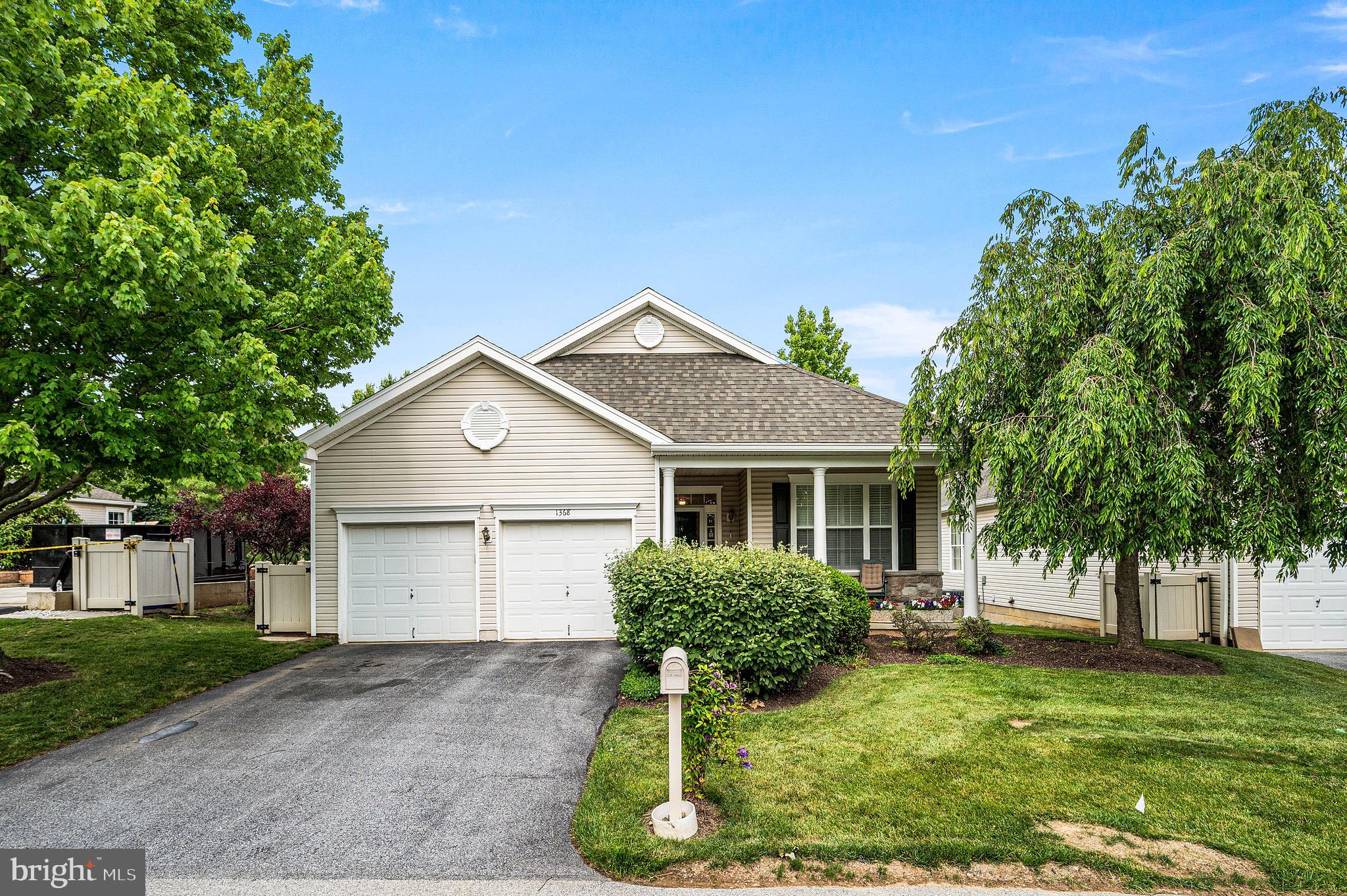 Welcome to 1368 Troon Lane, a beautifully positioned single-family home in the highly sought-after 55+ community of Hershey’s Mill. Perfectly positioned along the 3rd green, this home offers peaceful golf course views and an exceptional location.

This spacious two-bedroom, three-bathroom home features an extended sunroom and an abundance of comfortable main-level living space. Freshly painted throughout in a neutral color palette, the home boasts updated lighting fixtures and timeless wooden shutters in the living room, creating a warm and inviting atmosphere that’s ideal for both everyday living and entertaining.

The bright kitchen offers a large center island, a dining area, and seamless access to the expanded sunroom, where sweeping golf course views can be enjoyed from every angle. Step outside to the private patio, perfect for relaxing, dining al fresco, or taking in the scenic surroundings.

Down the hall, the generously sized second bedroom offers exceptional closet space and is conveniently located near a full hall bathroom. The spacious primary suite features a large walk-in closet and an en-suite bathroom with double vanities. A main-floor laundry room and ample storage complete the convenient one-level layout.

The fully finished walk-out basement nearly doubles the home’s living space. It includes French doors leading to a versatile bonus room that can serve as a guest bedroom, home office, or hobby room, along with an additional full bathroom. Built-in cabinetry provides abundant storage, while large windows and walk-out doors fill the lower level with natural light. A spacious utility room offers even more storage options.

Residents enjoy access to all of Hershey’s Mill’s outstanding amenities, including golf, tennis, pickleball, a community center, swimming pool, paddle tennis, and bocce courts.

Completing the home is a two-car attached garage, ample driveway parking, and one of the community’s most desirable locations. This is a wonderful opportunity to enjoy low-maintenance living with beautiful views and exceptional amenities in one of Chester County’s premier active adult communities.