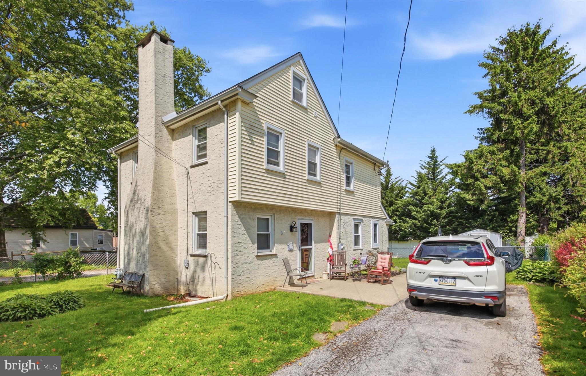 Charming & updated Home in poplar and quiet Larchmont Square neighborhood of Newtown Square.  Enter this home from the patio to a spacious living room with stone wood burning fireplace and hardwood floors, dining room with hardwoods, powder room, mud room with outside exit to rear yard, modern kitchen with pantry storage room and ample cabinet space, quartz countertops and hardwood flooring.  Kitchen appliances include refrigerator, stove, microwave, dishwasher and garbage disposal.  Second level has three spacious bedrooms and ceramic tile hall bath.  There is walk up floored attic with access from a bedroom. Lower level offers the laundry, utilities and storage. Low maintenance exterior with siding, capping and replacement windows. Some improvements include: Gas hot water heating system and central air conditioning installed in 2020. Includes Refrigerator, Washer, Dryer, Ceiling Fans and Storage Shed. The private driveway features off street parking space for 4 cars.  Nice level landscaped lot with storage shed and rear yard fencing. Convenient location with easy access to major commuting routes (3, 476, 1 & 202) to Center City, Media, West Chester, King of Prussia and the Philadelphia Airport. Close to Newtown Edgmont Little League & Petticoat League, Marple-Newtown High School and Delaware County Community College. Only minutes to Whole Foods, Swiss Farms, Starbucks and many other eateries and shopping centers. This is a great opportunity to own a home in the Marple Newtown School District with low taxes. Schedule your tour today!