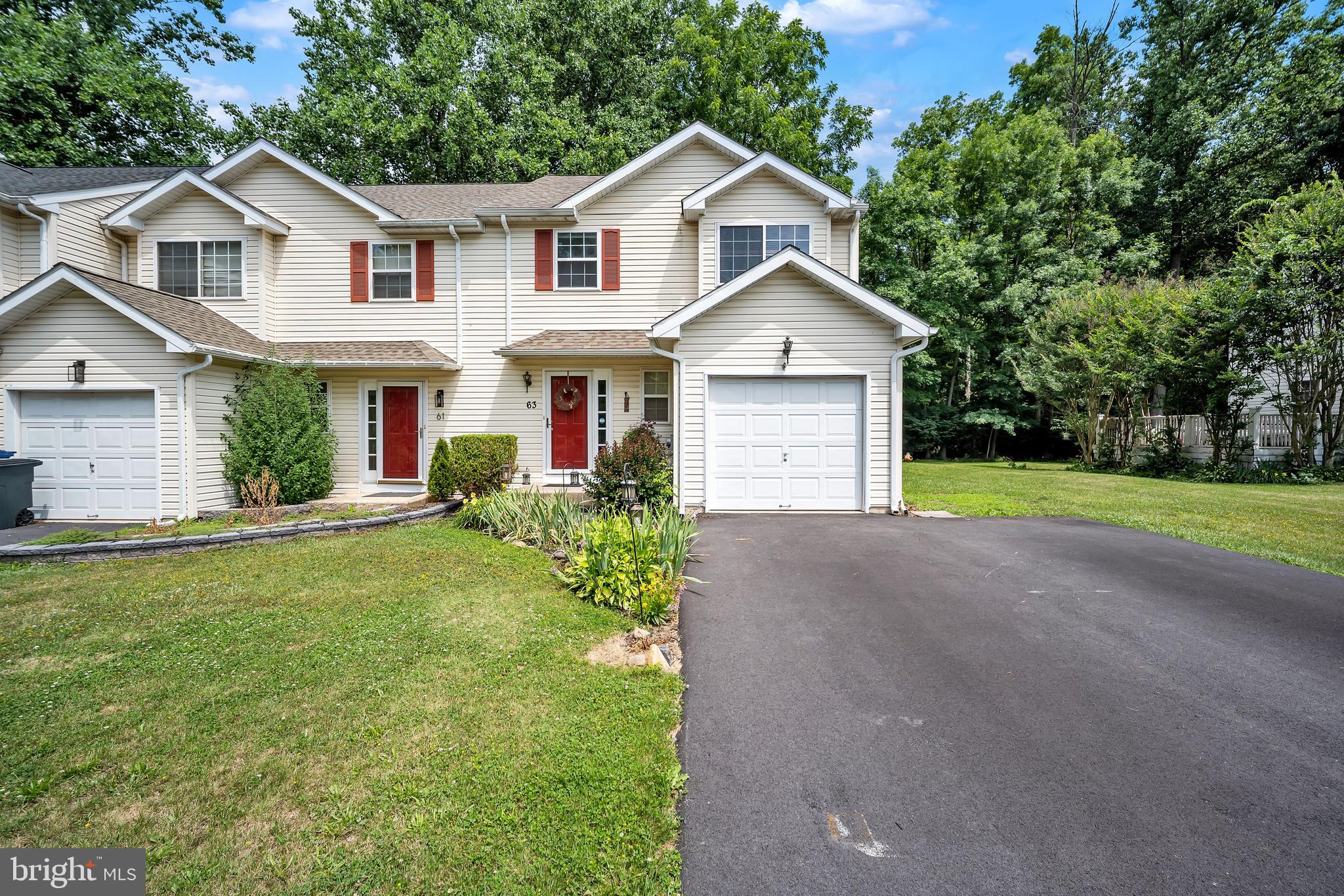 Welcome to this beautifully maintained, move-in-ready end-unit townhouse in the desirable Beacon Hill community of Valley Township. Featuring three bedrooms, one-and-a-half baths, a one-car garage, and a rare newly expanded four-car driveway, this home sits on one of the largest and flattest privately owned lots in the neighborhood. The spacious front and rear yards include a vegetable garden and back to peaceful wooded fields and open space. A large deck is the perfect place to relax, entertain, watch the country club’s annual Fourth of July fireworks, and occasionally catch a glimpse of the northern lights.

Inside, the main level offers a bright living room with new carpeting and an updated kitchen with stainless steel appliances. Upstairs are three comfortable bedrooms and a beautifully renovated full bathroom. The  lower level provides flexible living and entertaining space, a large custom pine bar with an included kegerator and mini refrigerator, and plenty of storage. Additional improvements include a newer roof and water heater, newer gutters with gutter guards, and a recently serviced HVAC system. The shed is negotiable. Convenient to shopping, dining, major routes, and Coatesville  Country Club, this home offers exceptional privacy, outdoor space, and convenience.

Professional Pictures will be uploaded on Friday