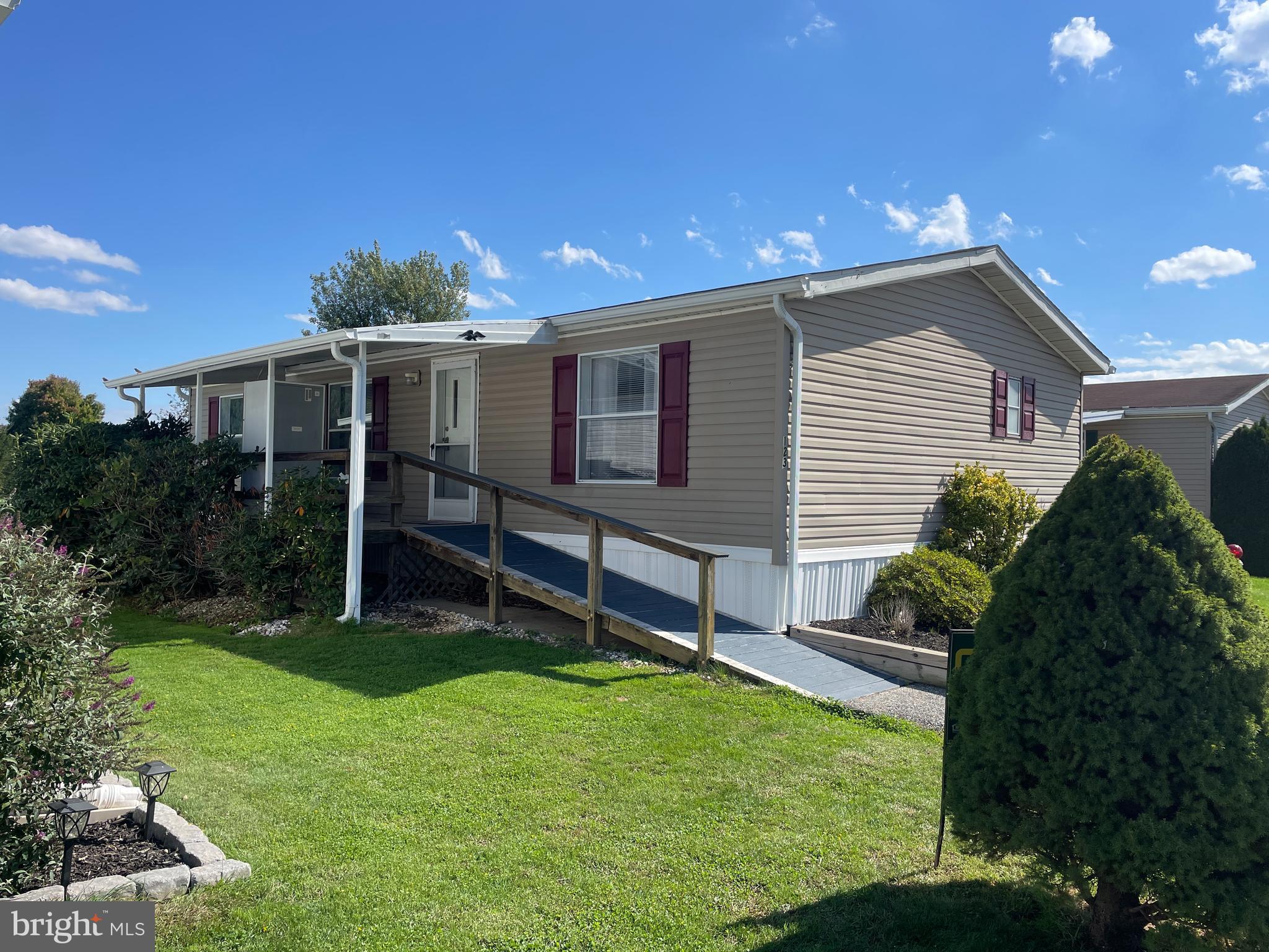 Must see - Renovated Doublewide with Ramp Access, covered porch, shed and all appliances included, new laminate flooring. 2 beds, 2 bath, total electric home... see 34 pics. $485 mo lot rent  (water, sewer, trash is extra.) Pets allowed. Located in Hellam Twp in Mimosa MHP.  This is now an over-55 age restricted community.  It has recently turned to an over 55 park so all occupants of the home must now be over age 55 even though you will see younger people in the park from before the switch.