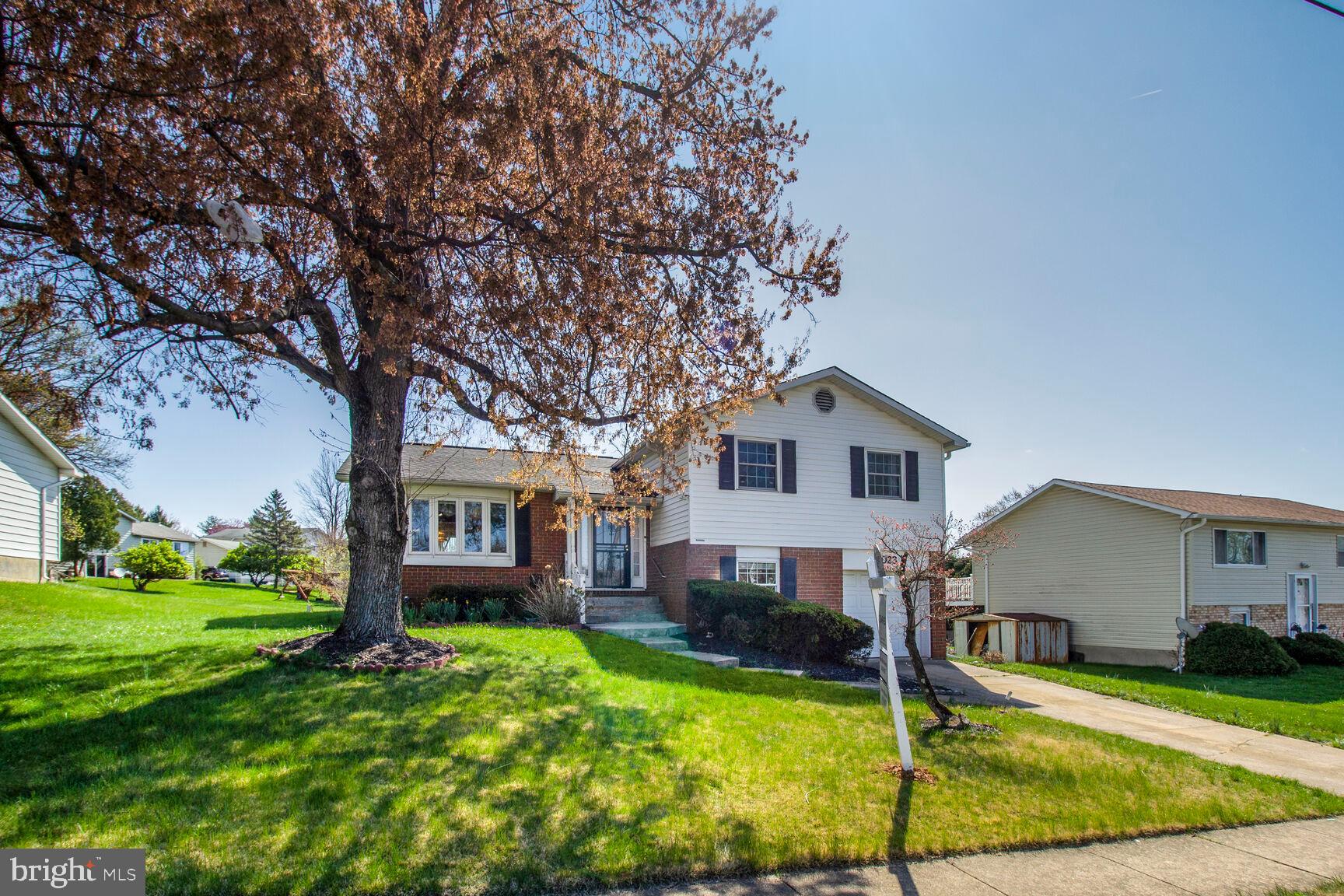 This home shows pride of ownership.  This spacious 4-level split home is ready for its new owners. Features 5 bedrooms & 2.5 Baths.  Bathrooms and kitchens were updated about 5 years ago with stainless steel appliances.  Cozy walk-out  basement has a wood burning fireplace, half bath and plenty of storage.  2nd Basement/family room features laundry and plenty of storage space, great potential for a 2nd family room or theatre/exercise room. Main level leads out to a deck with serene views of the backyard, which sits on  a 1/4 acre lot. There is a garage and additional off street parking in the driveway.  Please don't waste any time scheduling your appointment.  Sellers are motivated and priced this home to sale.