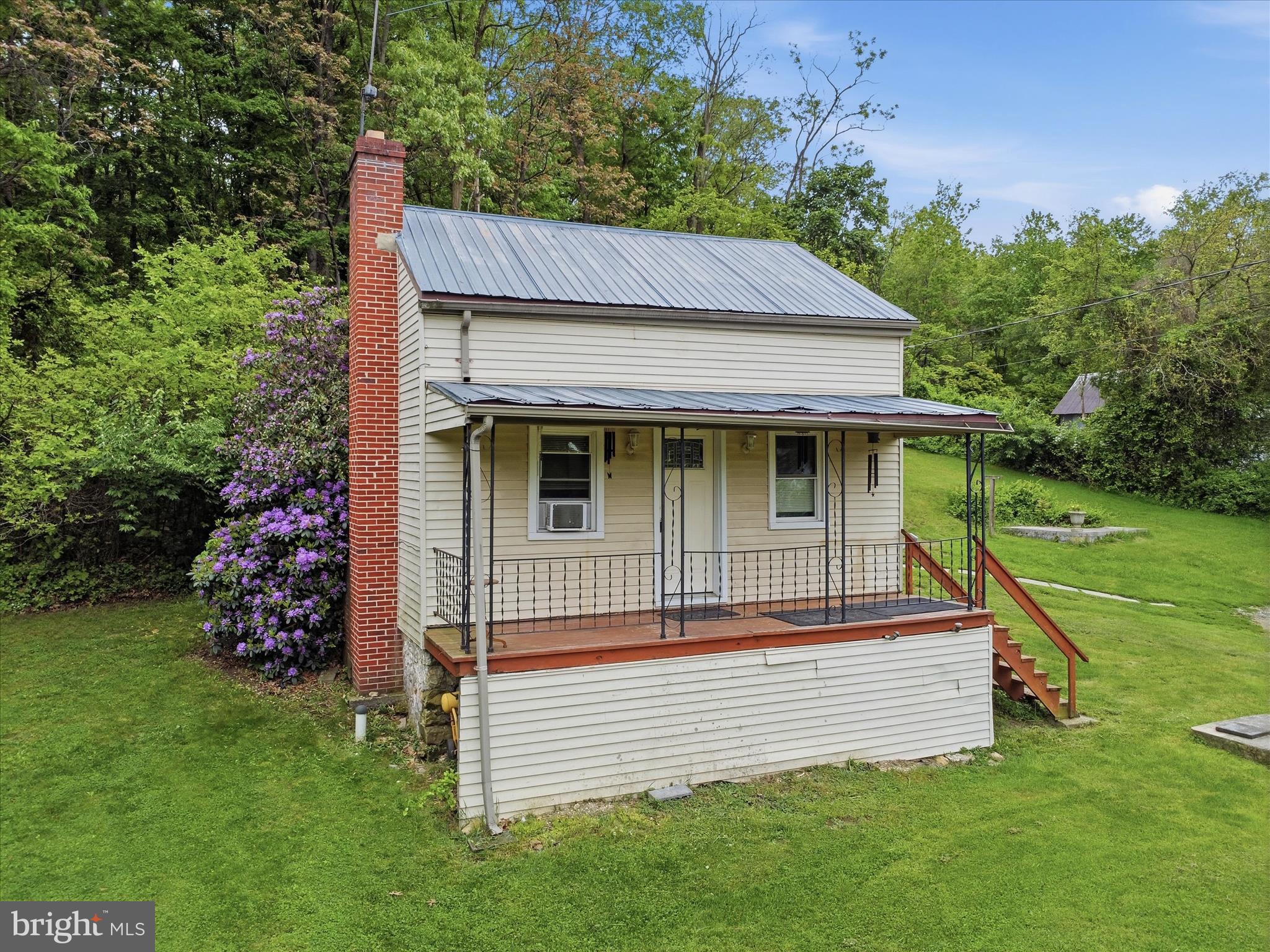Investors and cash buyers, take a look at 6570 Furnace Road — a 3-bedroom, 1-bath detached home on 1.40 acres in Waynesboro with flexible options. Currently tenant-occupied on a month-to-month lease, the tenant would love to stay and sign a new lease, giving investors potential day-one cash flow with zero vacancy. Prefer to make it your own? The tenant is open to moving, so owner-occupants paying cash or using conventional financing have a path in too. Inside you'll find hardwood floors, replacement windows, and a traditional layout with a main-level bedroom plus two more upstairs. Outside, enjoy a covered front porch,  and a private 1.40-acre lot that backs to trees — with an additional parcel included.  Whether you're building a rental portfolio or looking for an affordable Franklin County home, the numbers and flexibility here are hard to beat.