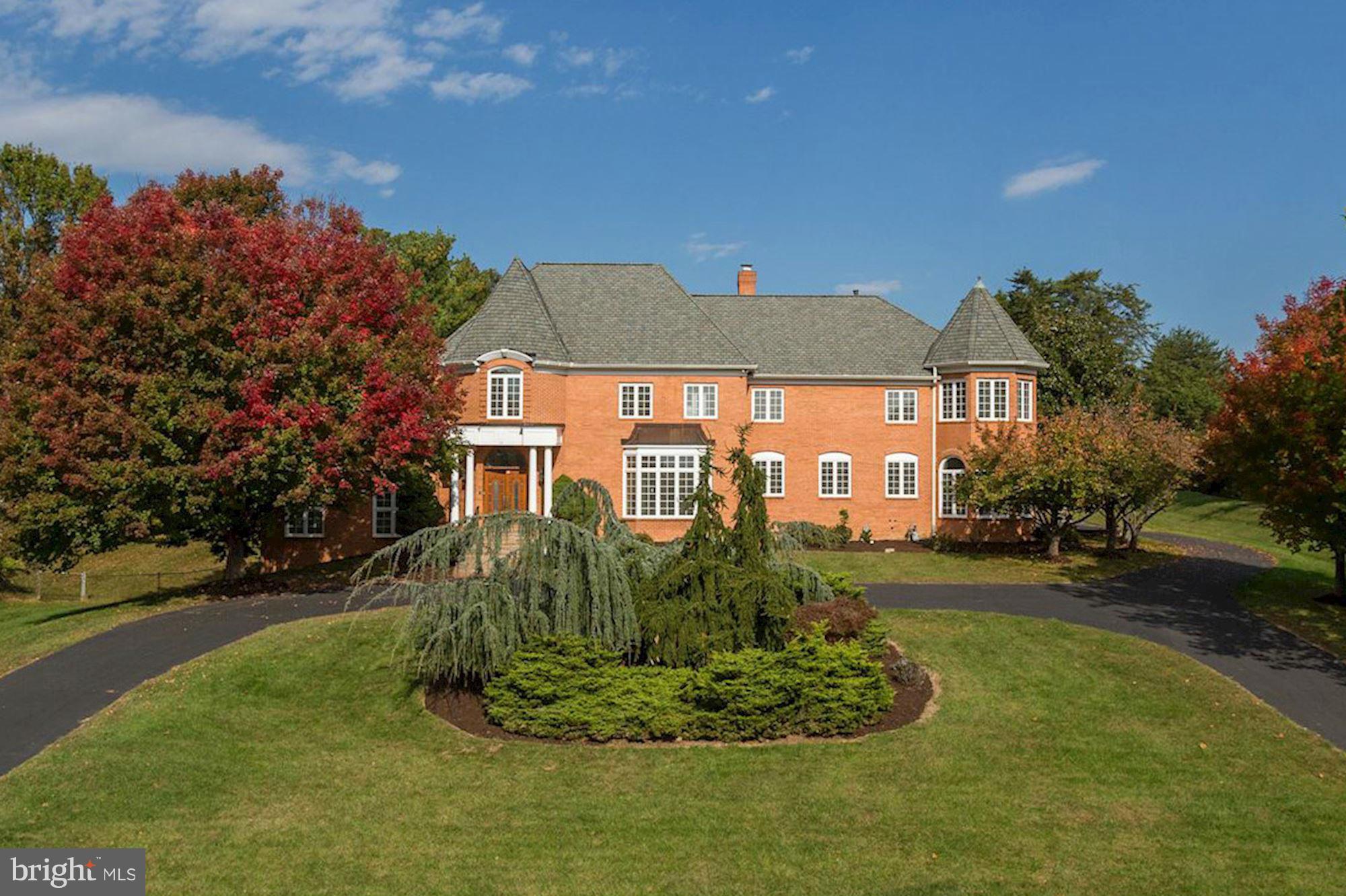 Incredible opportunity to purchase a wonderful estate in the heart of Potomac on 2 acs.with pool and tennis court. Almost 10,000 sq. ft. of finished space with grand two story foyer, large embassy sized rooms with over 10' high ceilings on 1st floor , paneled library, bedroom &  full bath on the 1st floor, master suite/sitting room, beautifully finished lower level and side entry four car garage.