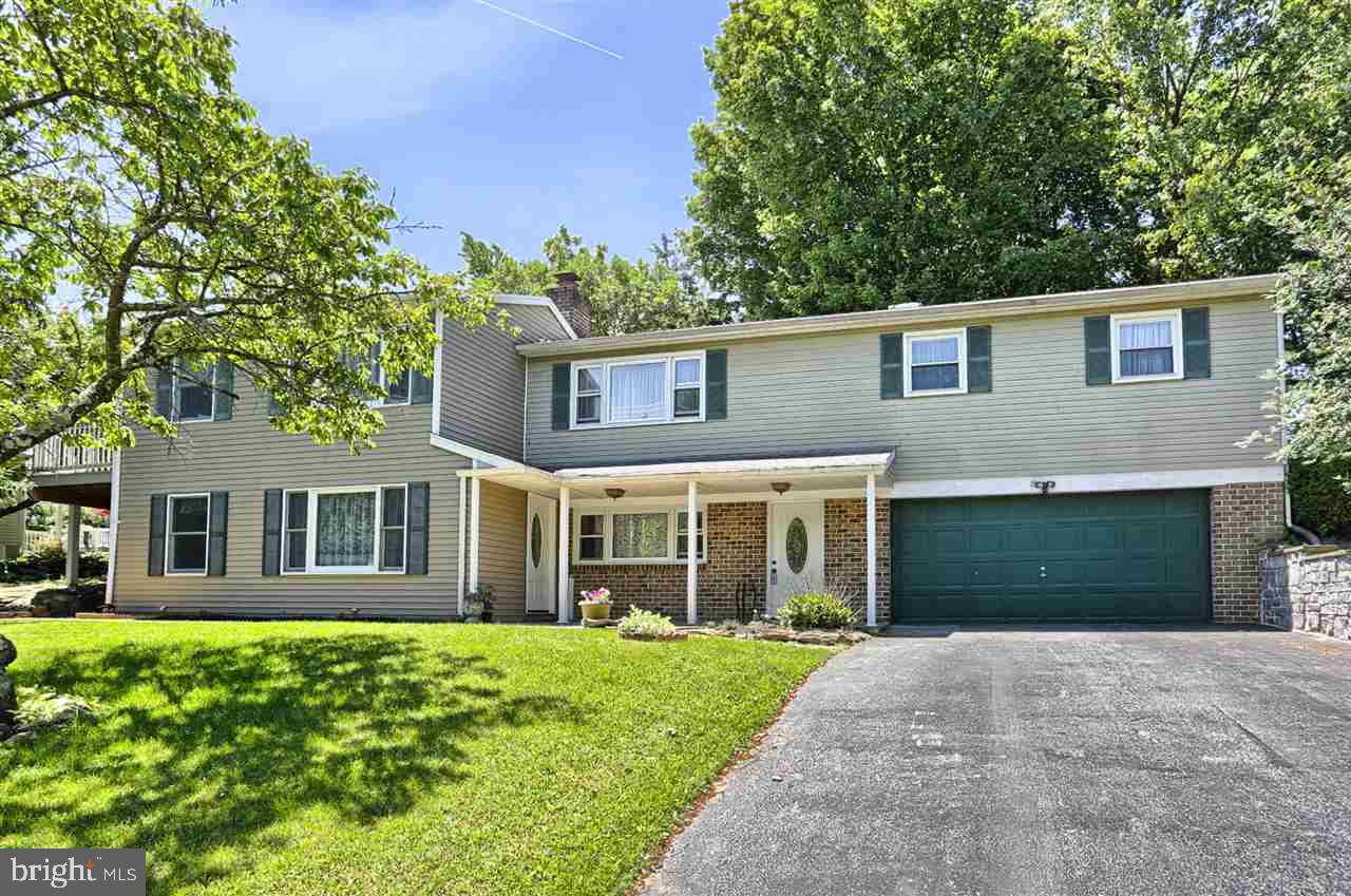 Spacious 4BR, 2.2BA Raised Rancher on 1/2 acre lot. Updated Kit w/SS appliances, recessed lights & breakfast area. Bright & Open DR & LR w/large picture windows overlooking front yard. Sunroom off Kit opens to private fenced in backyard w/in-ground pool, patio & deck. LL w/Kit, LR, BR, Full BA & separate entrance could be possible separate living quarters or home office. New carpet & paint! Nicely landscaped. OS 2 car gar. 1 year Home Warranty!