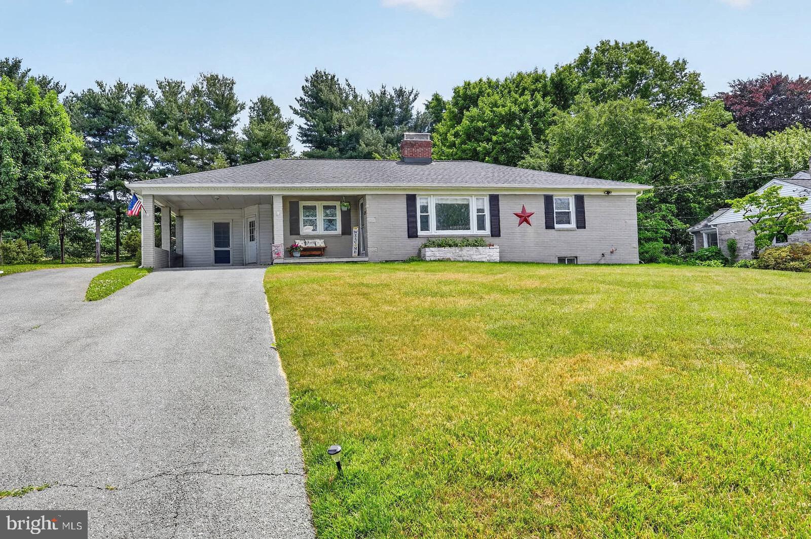 Check out sweet new price for this custom brick rambler - nestled in a serene setting, this rancher situated on just under 1/2 acre provides ease of living with upgrades throughout. Recently renovated primary suite with fantastic bathroom and walk-in closet/dressing room. Living room has large picture window to enjoy mountain views, as well as a brick front fireplace. The lower level includes not 1 but 2 spacious rooms for use as rec room, playroom, exercise room -- with full bathroom and bedroom, as well as the 2nd brickfront fireplace. Exit to rear fenced yard as well. Roof recently replaced and plenty of room for your guest parking when you entertain in your new home.