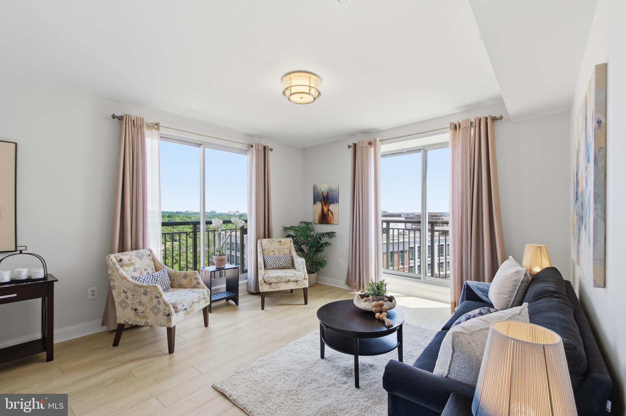 Luxury living in the heart of Alexandria’s sought-after Carlyle District! Welcome to #1001 at The Jamieson, an impeccable 10th-floor corner unit boasting 1,395 sqft of beautifully updated space. This rare 2BR/2BA plus Den/Home Office floor plan features stunning floor-to-ceiling windows with spectacular panoramic views of the Masonic Temple, Washington Monument, and U.S. Capitol. Enjoy fireworks right from your living room! Highlights include sleek LVP flooring throughout, customizable dimmer lighting, gourmet kitchen with granite countertops, breakfast bar, subway tile backsplash, under-cabinet lighting, and a stainless-steel appliance package. Unbeatable perks: a private 5x7 storage unit on the same floor and 2 deeded garage spaces (#61 and #116). Situated above The Westin Hotel, The Jamieson offers an elevated lifestyle with concierge service, secure building access, and residents can opt into separately billed hotel premium services like room service, housekeeping, and full fitness center. On-site EV charging is also available. Make sure your agent shows you the ROOFTOP DECK!! A true commuter's paradise just blocks from the King Street Metro pedestrian tunnel, Eisenhower Metro, and Amtrak. Enjoy walkable access to Wegmans, Whole Foods, AMC Theaters, John Carlyle Square Park, and historic King Street. Stroll to historic Old Town or ride the free trolley to the waterfront for a water taxi to Georgetown or National Harbor. Unbeatable location minutes to Reagan National Airport, Amazon HQ2, Pentagon, and Washington, D.C. Space, Views, Parking, Storage, and Location #1001 delivers it all!
A 2 bedrooms & 2 baths condo rarely comes on the market from this building.

Asking price is below the assessment!!