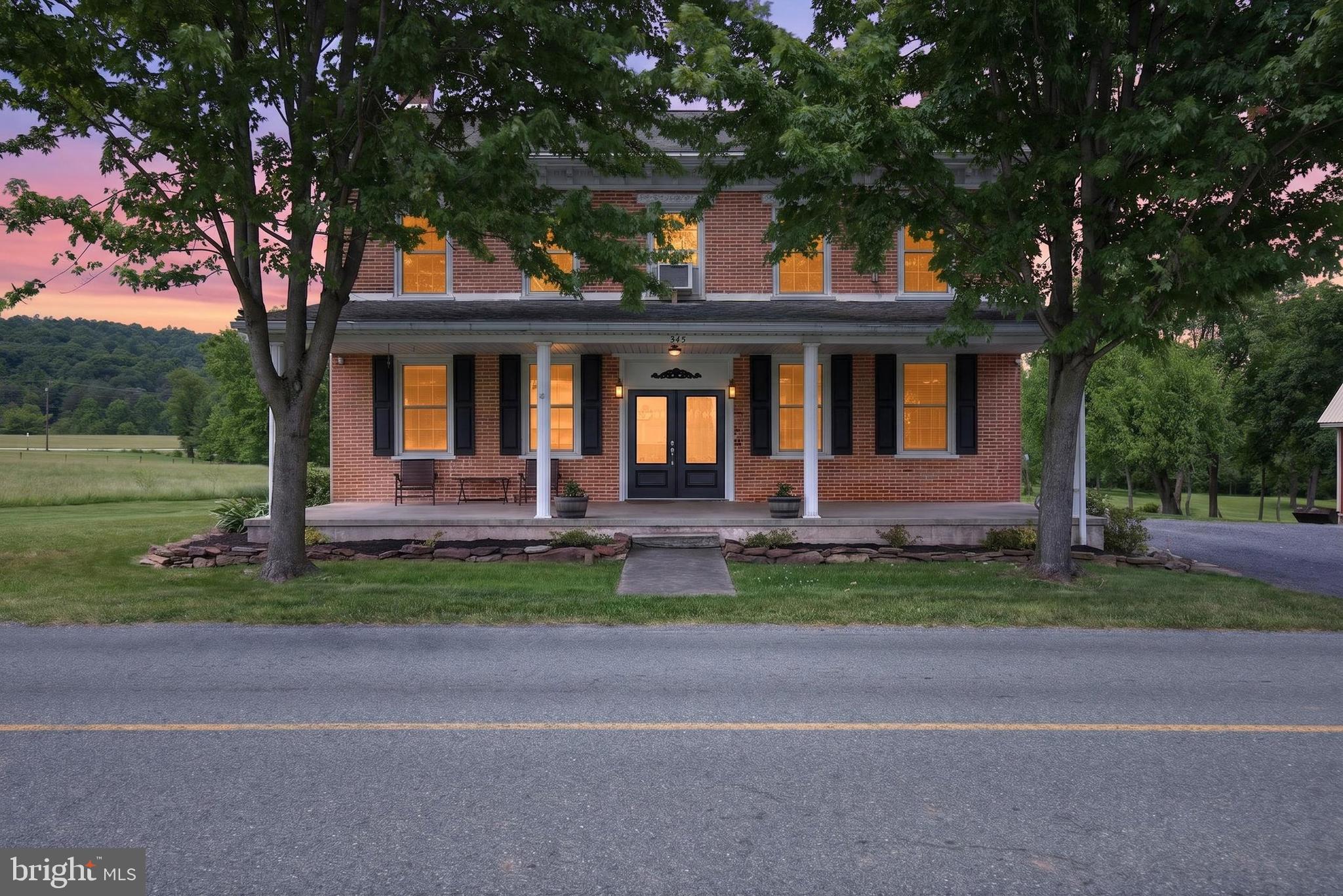 SELLER CONCESSION OF $10,000 towards closing cost or buyer down interest rate!!!

Welcome of this exceptional circa 1856 all-brick farmhouse. Situated on 7.5 scenic acres featuring a tranquil pond and an oversized two-car garage, this 3,406 sq. ft. residence beautifully balances historical preservation with thoughtful modern updates. The property offers a perfect blend of country charm while remaining conveniently located just minutes from historic downtown Gettysburg.

The spacious interior highlights original millwork, pine and chestnut hardwood floors, high ceilings, and a vintage freestanding clawfoot tub. The home includes a remodeled kitchen and a formal dining room that provides ample space for gatherings. Additionally, a functional summer kitchen is ideal for canning and supporting a homegrown lifestyle. The main level also features a large family room with a brick fireplace and a flexible space perfect for an office, study, or additional bedroom and a full bathroom.

The second floor includes a primary bedroom along with three additional bedrooms and two full bathrooms. For extra storage, the home offers a full walk-up attic. The exterior is equally impressive, featuring an inviting front porch, a partially heated 24x36 garage equipped with 100 amp electric, plumbing for water & sewer and an upper level perfect for hobbies or specialized projects.

You can relax and enjoy peaceful views from either the rear patio or the balcony overlooking the pond. The property has been meticulously maintained, please reference the attached detailed list of recent updates and renovations. Seller just installed new septic pump with 3 year warranty 5/26