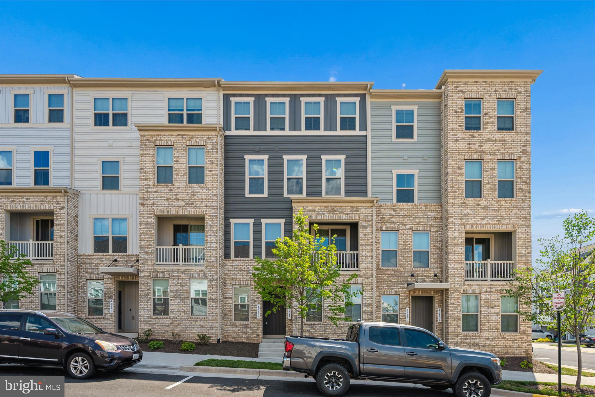 Welcome to this stylish nearly new residence in the heart of Arcola Town Center.
Enjoy the ease of low-maintenance living in this beautifully maintained four-level townhome-style condominium, offering the privacy of having no residences directly above or below. This desirable Juliet model combines modern design, functional living areas, and a convenient Loudoun County location close to shopping, dining, commuter routes, and Dulles Airport.
****The lower level welcomes you with interior garage access, a well-placed half bath, and a flexible bonus room that can easily serve as a private office, fitness area, recreation space, hobby room, or additional lounge. ****The main living level is bright, open, and inviting, featuring a comfortable living area, a defined dining space, and a well-appointed kitchen with a generous island, sleek cabinetry, and contemporary finishes. Just off this level, the outdoor deck provides a great setting for fresh air, casual meals, or a quiet start to the day.
The private owner’s retreat occupies its own level and offers a spacious bedroom, walk-in closet, and an elegant en-suite bath with dual sinks. The upper level includes two additional bedrooms and a full bathroom, creating excellent space for family, guests, work-from-home needs, or additional storage.
****Set within the lively Arcola Town Center community, homeowners can enjoy neighborhood amenities such as a swimming pool, clubhouse, playground areas, and walking trails. With a fresh, modern feel and a smart multi-level layout, this move-in-ready home delivers comfort, convenience, and everyday practicality in one of the area’s growing mixed-use communities.

HIGHLIGHTS 
* 2025 Built Home 
* Low Condo Fee
* All 4 levels just for you 
* Town Home Structure with Low maintenance
* Upgraded Flooring and Ceiling Lights
*Neighborhood amenities such as a swimming pool, clubhouse, playground areas, and walking trails
*convenient Loudoun County location close to shopping, dining, commuter routes, and Dulles Airport.