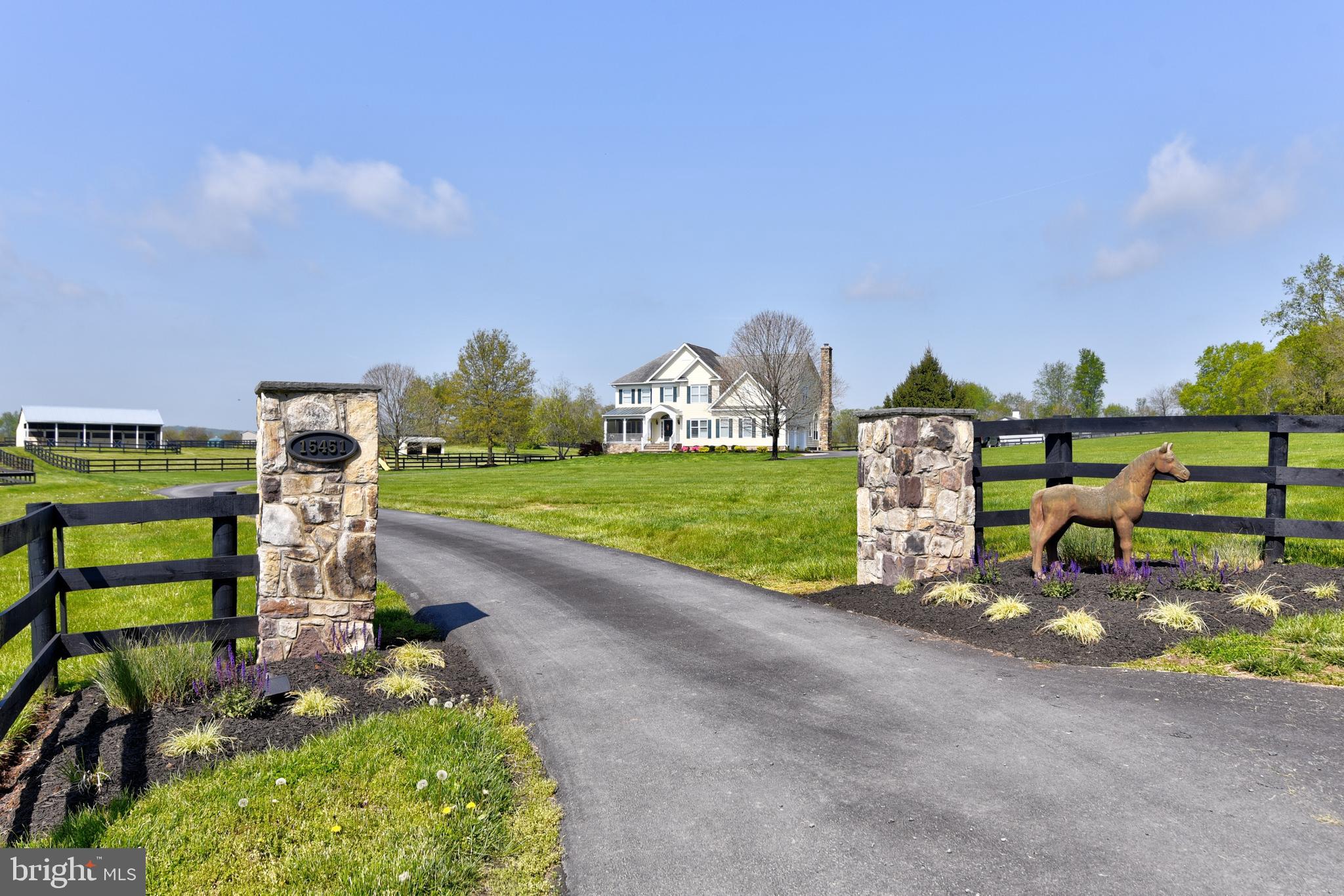 Priced UNDER Appraised Value – Instant Equity!! Open House September 18th. This spectacular 25+ acre Equestrian Farm is 6 miles from historic Leesburg and located among several beautiful wineries. The property includes the 3-level 1998 Colonial home with 5 beds, 4.5 baths, 5,300 sq ft, 2 car garage, Trex deck and a relaxing large patio pre-wired for your hot tub. The 2017 custom Amish-built 10 stall center aisle Barn with over 8,000 sq ft has every amenity desired with premier equestrian facilities. Barn facility includes rubber floors and matted stalls for comfort, Stallion stall with covered run out, wash rack, laundry room, climate controlled tack room with fireplace and a 12’x36’ office, and the loft stores 2,000+ hay bales with stall shoots. The apartment hosts 2 beds, 2.5 baths, 3,000 sq ft with private entrance, separate laundry and is perfect as a rental for your in-house trainers, veterinarians, or as a luxurious guest house for family and friends. Enjoy your morning coffee from your screened-in porch as you survey the 11 paddocks each with electrical & water, 5 run-ins, over 2 miles of newer 3 board hotwire fencing, ¾ mi bridle path, Riding Ring with GGT Footing, 50’ Round Pen, covered 5-horse Q-Line Eurowalker, and the additional 4 stall shed row barn with feed, storage & run-ins. The Barn driveway provides easy horse loading and unloading with ample parking for trailers, equipment, and so much more! Owners have thought of everything including the Barn chandeliers! Barn/Apartment complex has its own well, septic and electric. Apartment tenant has lease with 30 days notice. Owners agree to existing road maintenance agreement and restrictive covenants for residential and agricultural use; no industrial or commercial activities.