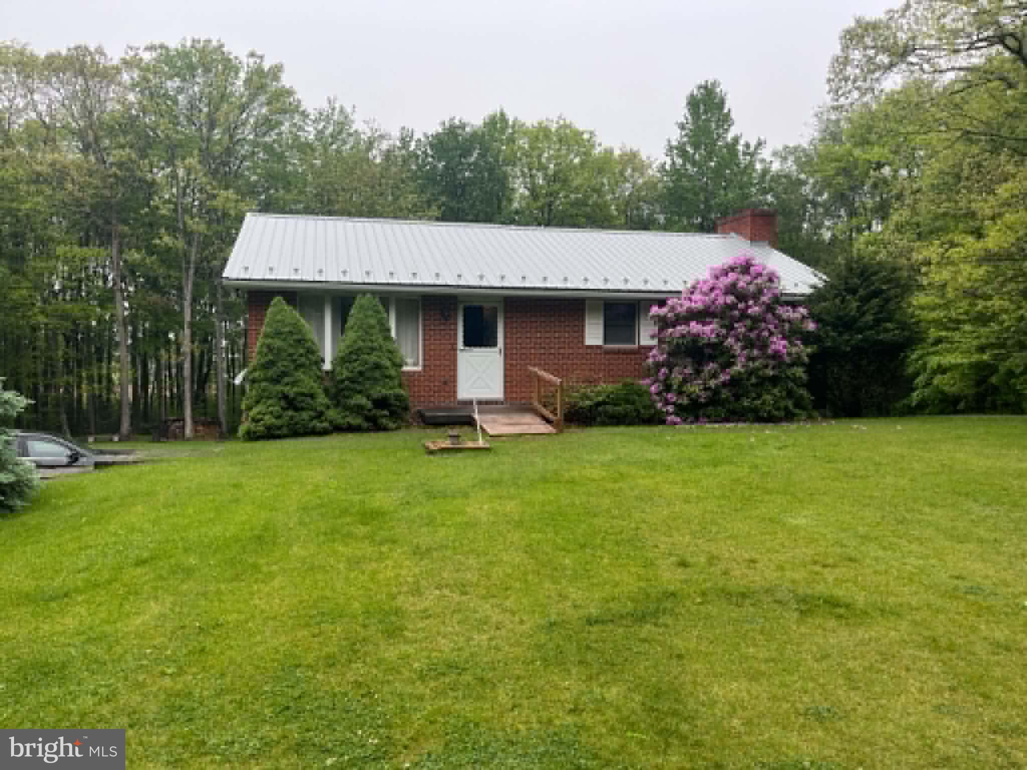 Country Ranch Home on 2.65 Acres – Near Deep Creek Lake & New Germany State Park

3 bedroom, 1.5 bath ranch-style home situated on 2.65 scenic acres with gorgeous country views and plenty of space to enjoy the outdoors. Conveniently located just 5 minutes from New Germany State Park and only 15 minutes from Deep Creek Lake State Park, this property offers the perfect balance of privacy, recreation, and convenience.

The home features a spacious layout with a partially finished basement offering approximately 1,000 square feet of additional living or storage space. Heating options include coal, wood, and electric furnaces, giving flexibility and efficiency throughout the seasons.

Outside, you’ll find a detached 42’ x 24’ three-car garage with electricity, ideal for vehicles, a workshop, hobbies, or extra storage. The large parking area provides plenty of room for guests, trailers, RVs, or recreational equipment.

 3 bedrooms
* 1.5 bathrooms
* 2.65 acres
* Ranch-style home
* Approx. 1,000 sq ft partially finished basement
* Detached 42’ x 24’ 3-car garage with electric
* Large parking area
* Coal, wood, and electric furnace
* Beautiful country views
* Great location near parks and Deep Creek Lake

Message for more details or to schedule a viewing.