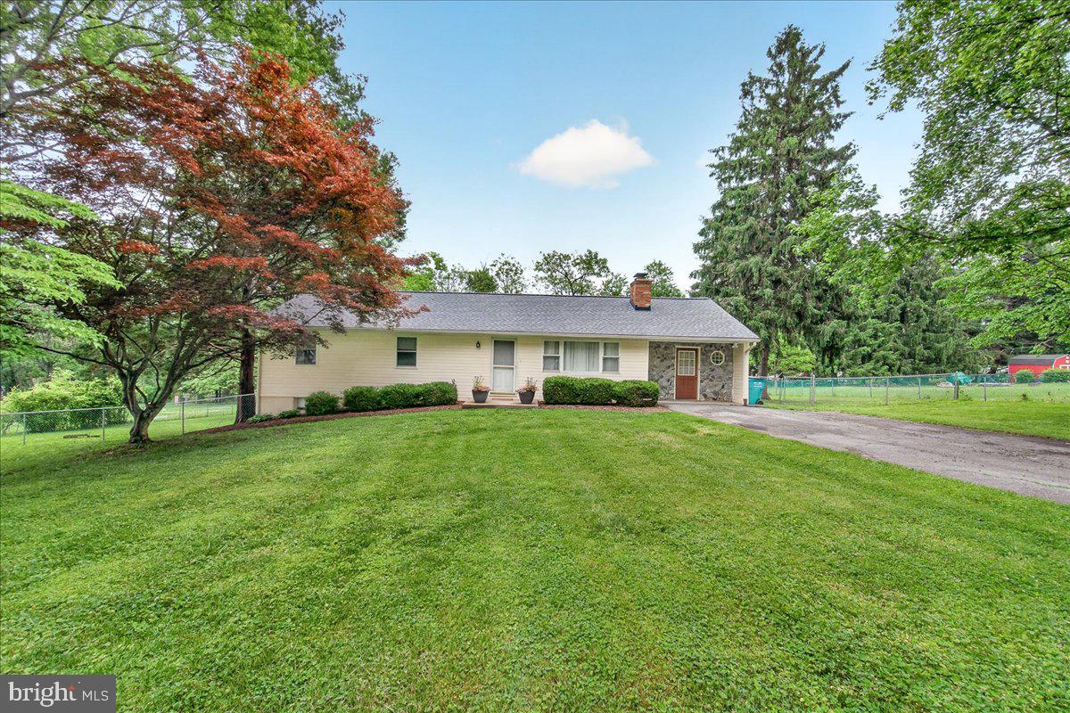 Charming and spacious ranch-style home situated on over half an acre! This well-maintained property offers the ease of one-level living with three main-level bedrooms and a full bath. The inviting living room features elegant crown molding and a cozy wood-burning fireplace, creating the perfect space to relax and unwind. The updated kitchen is move-in ready with granite countertops, upgraded cabinetry, and all stainless steel appliances included. This home features hardwood flooring and crown molding throughout. Original carport has been transformed into interior living space perfect for an office or large playroom. Thoughtful and energy efficient enhancements include ethernet availability in office and entertainment room and ecobee smart thermostat with remote room sensors.
The finished lower level expands your living space with a large rec room with recessed lighting, ceiling fans and wired for surround sound. The basement has an additional room and a second full bathroom—ideal for guests, a home office or multi-generational living. There is also ample unfinished space for storage, a workshop, or hobby area.
Step outside to enjoy the well manicured yard with a paver patio, raised garden bed, stone fire pit and endless possibilities for entertaining or outdoor recreation. A large storage shed includes electric and concrete floor provides plenty of room for tools and equipment. House and shed have newer roof, and the water pressure tank was replaced in 2026. Conveniently located in the sought-after Urbana School District with no HOA, and close to commuter routes. This home offers the perfect combination of comfort, space and flexibility in a peaceful setting.
