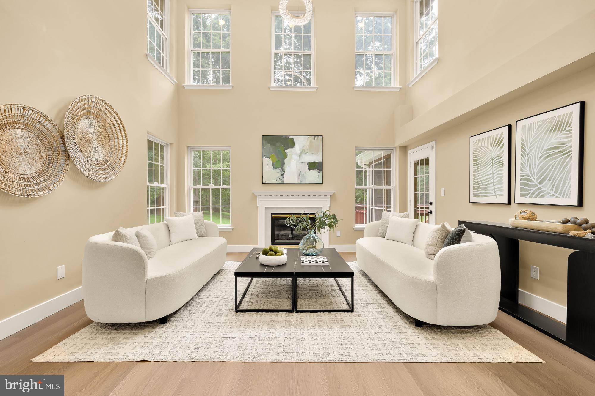 Completely remodeled from top to bottom, this estate home sits on 2.5 private acres and offers nearly 6,000 square feet of beautifully updated living space. Floor-to-ceiling windows fill the home with natural light, while designer lighting, oversized rooms, and quality finishes can be found throughout.

The renovated kitchen features sub zero refrigerator and high end cove appliances, custom cabinetry, quartz countertops, a large center island, and a sunny breakfast area, with a separate formal dining room ready for larger gatherings. Just off the kitchen, the family room is anchored by a wood-burning fireplace, creating a comfortable place to gather, while the sunroom offers the perfect spot to enjoy your morning coffee, read a book, or take in the views of the backyard. A private main-level office with double doors provides a quiet workspace.

Upstairs, you'll find four spacious bedrooms, including an impressive primary suite with a renovated bath featuring an oversized shower with waterfall and rain shower heads, a soaking tub, double vanity, and a huge walk-in closet with custom built-in cabinetry.

The walkout lower level expands the living space with a large recreation room, a legal fifth bedroom, full bathroom, multiple flexible living areas, and a beautifully finished theater room.

Outside, enjoy the screened porch, adjoining deck with stairs leading to the fenced backyard, and two-acre lot with plenty of room to spread out. A three-car garage, oversized driveway, and storage shed complete the property.