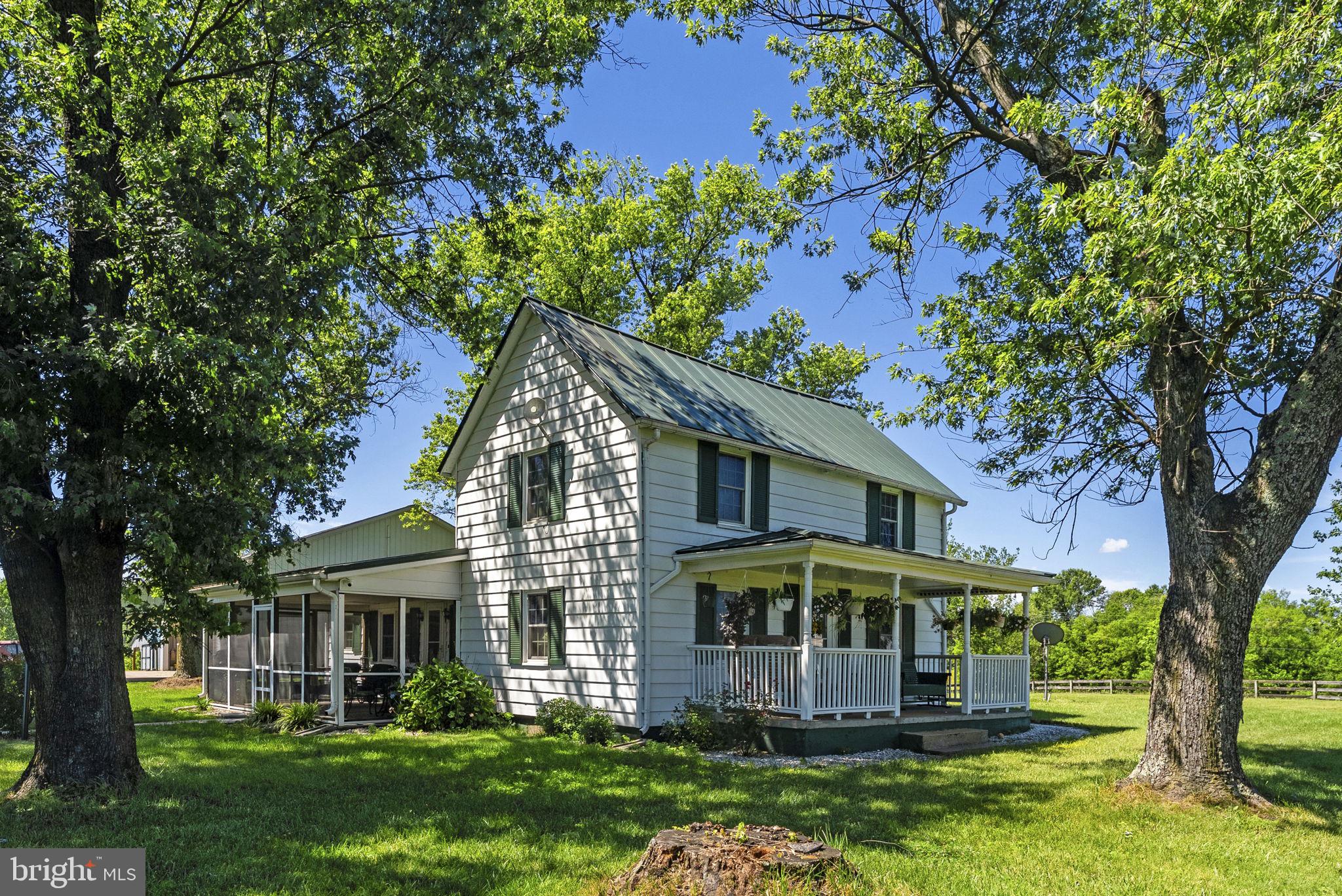 The Ultimate Country Estate & Family Compound Potential

Escape to your own private island of peace and tranquility just moments from the historic Town of Culpeper and Route 29!
 Perfectly positioned for an effortless commute to Charlottesville, Warrenton, or DC, this stunning 58.5-acre farm offers the ultimate blend of rural serenity and modern convenience—complete with Verizon Fios high-speed internet. 
Comprised of 4 distinct tax parcels with additional lot cuts available, this property is a rare find, uniquely suited for a multi-generational family compound, working cattle operation, or custom equestrian estate.
The sweeping, tree-lined driveway welcomes you to a beautifully updated and  loved 1920s farmhouse. Spend your mornings on the expansive covered front porch or unwind on the side screened porch, both offering breathtaking, panoramic pastoral views.

The fully fenced acreage (board, wire, and electric fencing) is entirely turn-key for livestock or horses, featuring rich open pastures, a flowing creek, 3 wells, 4 frost-free hydrants, and 3 Ritchie automatic water feeders. Exceptional infrastructure includes massive equipment buildings, hay barns, a substantial garage shop, and countless storage sheds. Whether you dream of a thriving agricultural venture, a boutique Christmas tree farm, or simply a secluded sanctuary to gather your family, this hidden gem is an adventure waiting to be had. Welcome home to the farm you’ve always imagined.