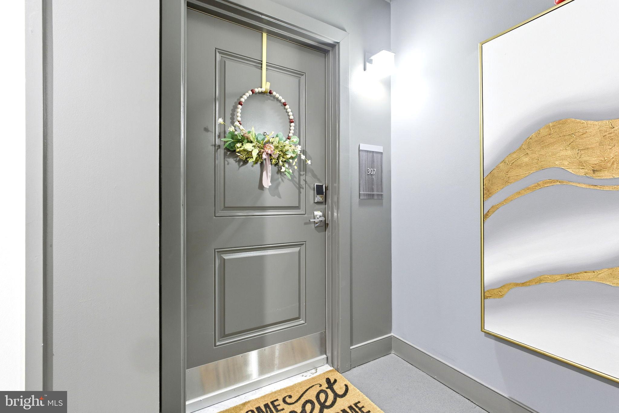 JUST REDUCED!!! Welcome to one of the fabulous and meticulously maintained condominium in the most popular National Harbor - a tourist haven ideally located in the waterfront within the boundaries of Maryland, Virginia, and Washington, DC. This condominium, which is only two years old, is a representation of the owner's love for elegance, timeless beauty, and superior regards for cleanliness and hygiene.  Their love for their abode is reflected on how they care for the property making sure that it is regularly kept neatly and orderly.
Prospective occupants of this property will definitely be pleased and happy when they take ownership of this unit.  It has been properly and precisely maintained, making you feel that you're taking possession of a newly constructed residence.
As soon as you set foot on the foyer, you will be amazed with the high- end looking luxury vinyl plank flooring which spreads to the open concept layout.  The end unit location of the condo allows for all around windows fitted with blinds, capturing three sides of scenic views of the vibrant community.  The seamless flow of the receiving area is architecturally designed with a beautiful kitchen equipped with stainless steel kitchen appliances, quartz countertop, spotless backsplash, 42- inch cabinets with upscale cabinet handles and accessories.  The cooktop is enhanced with commercial type range hood also in stainless steel.  The wall oven with microwave completes the kitchen ensemble.  The kitchen island with sink serves as an eat-in counter as well and can accommodate up to five bar stools/chairs.  The unique pendant lights hanging on the kitchen island provide ample brightness. Both the dining and living room areas are enhanced with luxurious chandeliers which contribute to the brilliance provided by the recessed lights on the ceiling.  You will be amazed with the vastness of the primary bedroom which has an en-suite bathroom with stand-up shower, a luxurious vanity with double sink, and a huge walk-in closet.  The second bedroom which can serve as a guest room, is ideally located on the other side of the unit providing privacy to the occupant while enjoying the serene and beautiful views from the windows.  Both bedrooms have affluent carpeted flooring.  A second full bathroom with soaking tub is conveniently positioned adjacent to the bedroom and the laundry room.  Springtime season is almost in the horizon - relax and enjoy the balcony overlooking the stream of similarly beautiful condominium complex and the panoramic views of Washington DC and Oxon Hill.  
Enjoy life peacefully and confidently while you're here. - your privacy is secured by utmost security policy - nobody can infiltrate your residence without granted permission from the homeowner.
Take delight and pleasure on everything that National Harbor has to offer; MGM Hotel and casino, restaurants, Gaylord National Resort and Hotel, Tanger Outlets, scenic Potomac River trails, etc... close to Oxon Cove Park & Hill Farm which provide enjoyment activities the whole year round like playing with farm animals and concelebrate with their yearly fall festival.  Accessible to Routes 95, 495 and 295.  Minutes to Alexandria, Virginia, and Washington, District of Columbia. MOTIVATED SELLERS!!!!!
