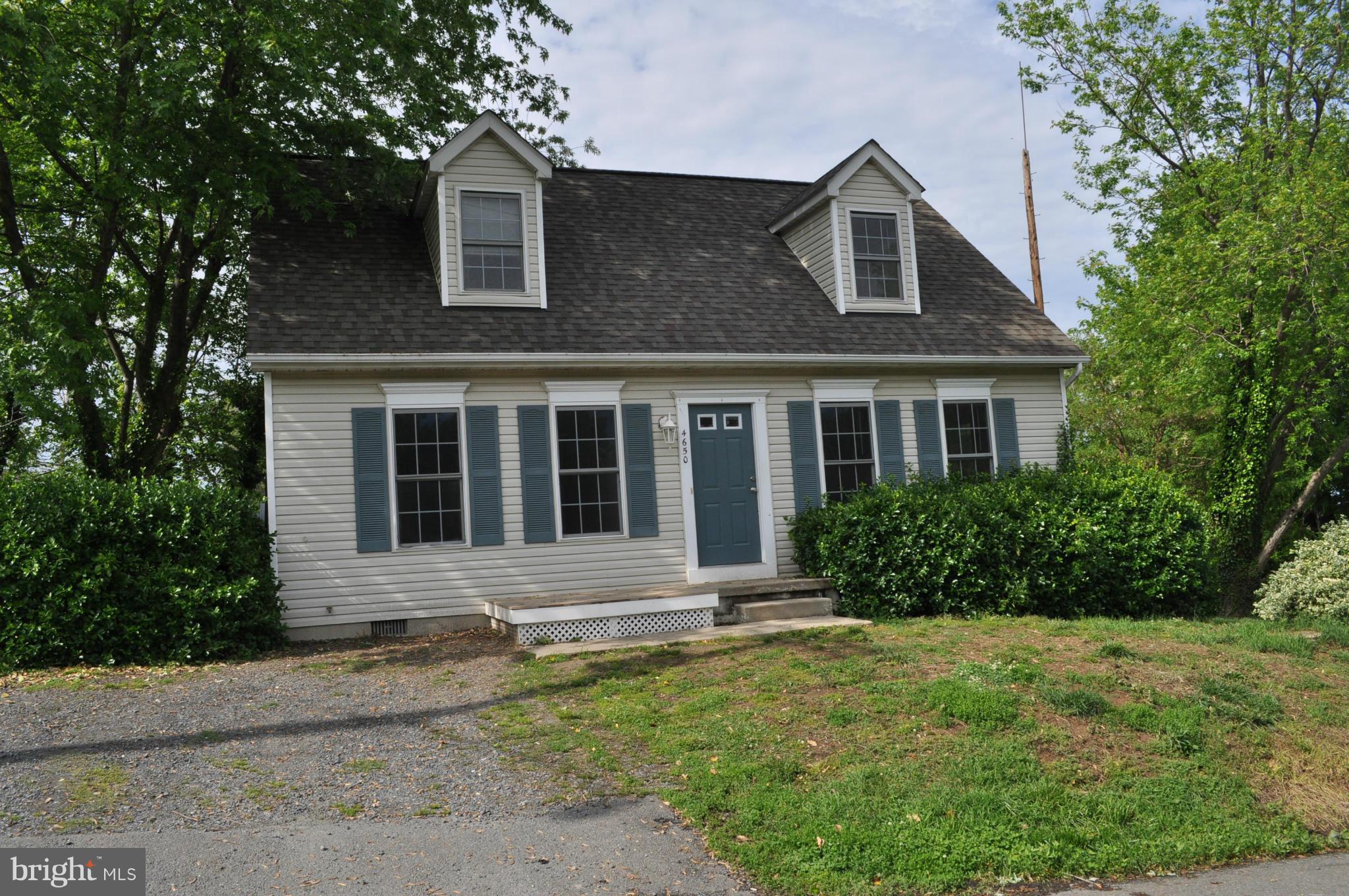 Opportunity to own a home just one block from the water. Fresh and clean inside - awesome kitchen with granite countertops and Stainless appliances, hardwood floors in living room. First floor bedroom and separate laundry room. Shows well - ready to go.