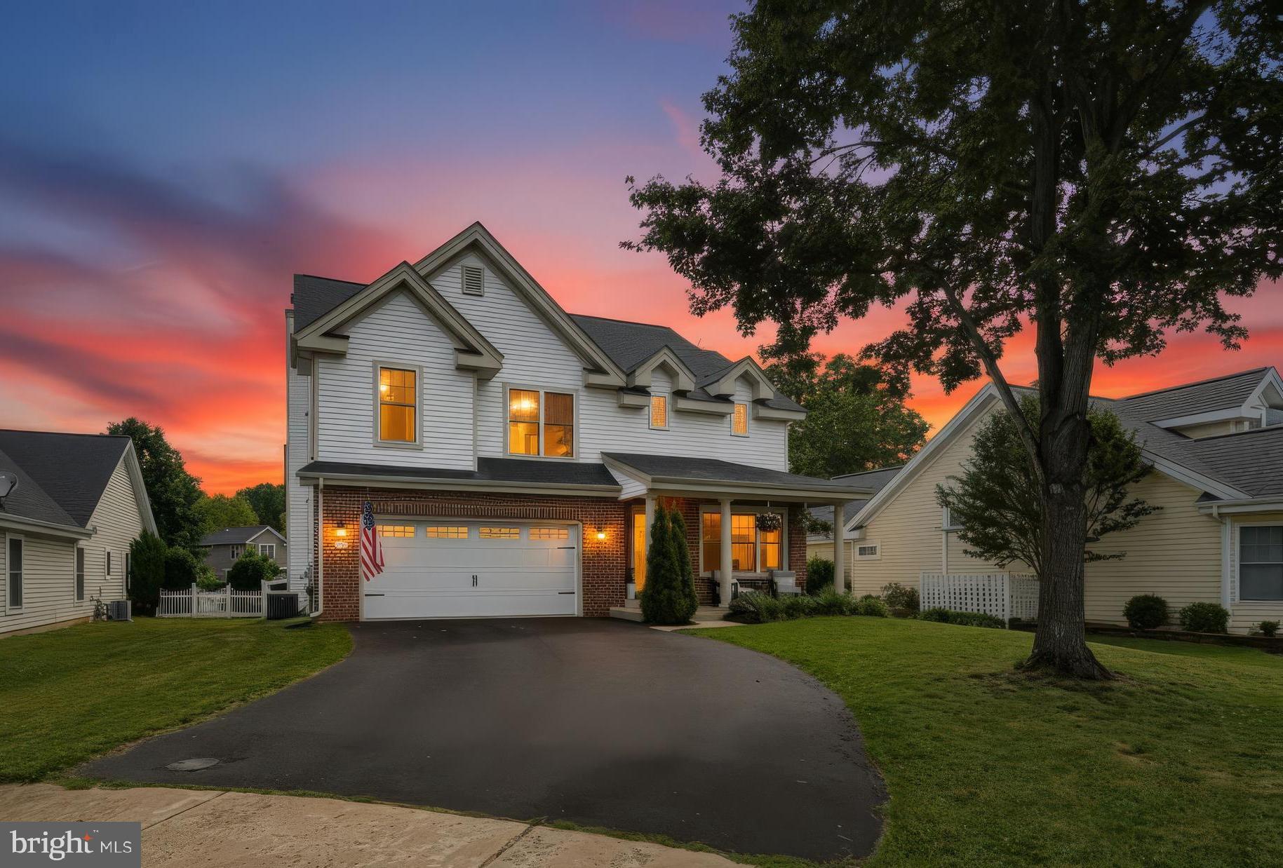 This stunning and stylish colonial sits on a friendly cul-de-sac in an amazing neighborhood! Gourmet kitchen including stainless steel appliances (2 years)  and tasteful  granite countertops.  Barn doors to large pantry.  Recessed lighting.  New sliding glass door to covered patio with level backyard beyond, complete with play equipment for the little ones.  Open to spacious and comfy family room with woodburning fireplace.  Laundry/mudroom conveniently located off family room as you enter from garage.  Both foyer and living room boast two-story ceilings for a very special entry impact. Hardwood flooring throughout main level.  Elegant dining room with large bay window overlooks tranquil backyard setting. Watch the kiddies frolick and play with fenced-in safety.  Upstairs boasts large primary bedroom with huge walk-in closet.  Beautiful primary bathroom features large soaking tub,  designer tiled shower, and dual sinks.  An additional 4 generous bedrooms upstairs with a gorgeously appointed bathroom to accommodate.  Additionally there is a private 6th bedroom  on the lower level with it's own full bathroom!  Lower level also has a roomy extra family room for entertaining, and a separate storage room.   New kitchen appliances (2024); brand new washer/dryer (2025); HVAC 2022;  and newer roof (2021)!  See this beautiful home to experience the full effect -- impressive!